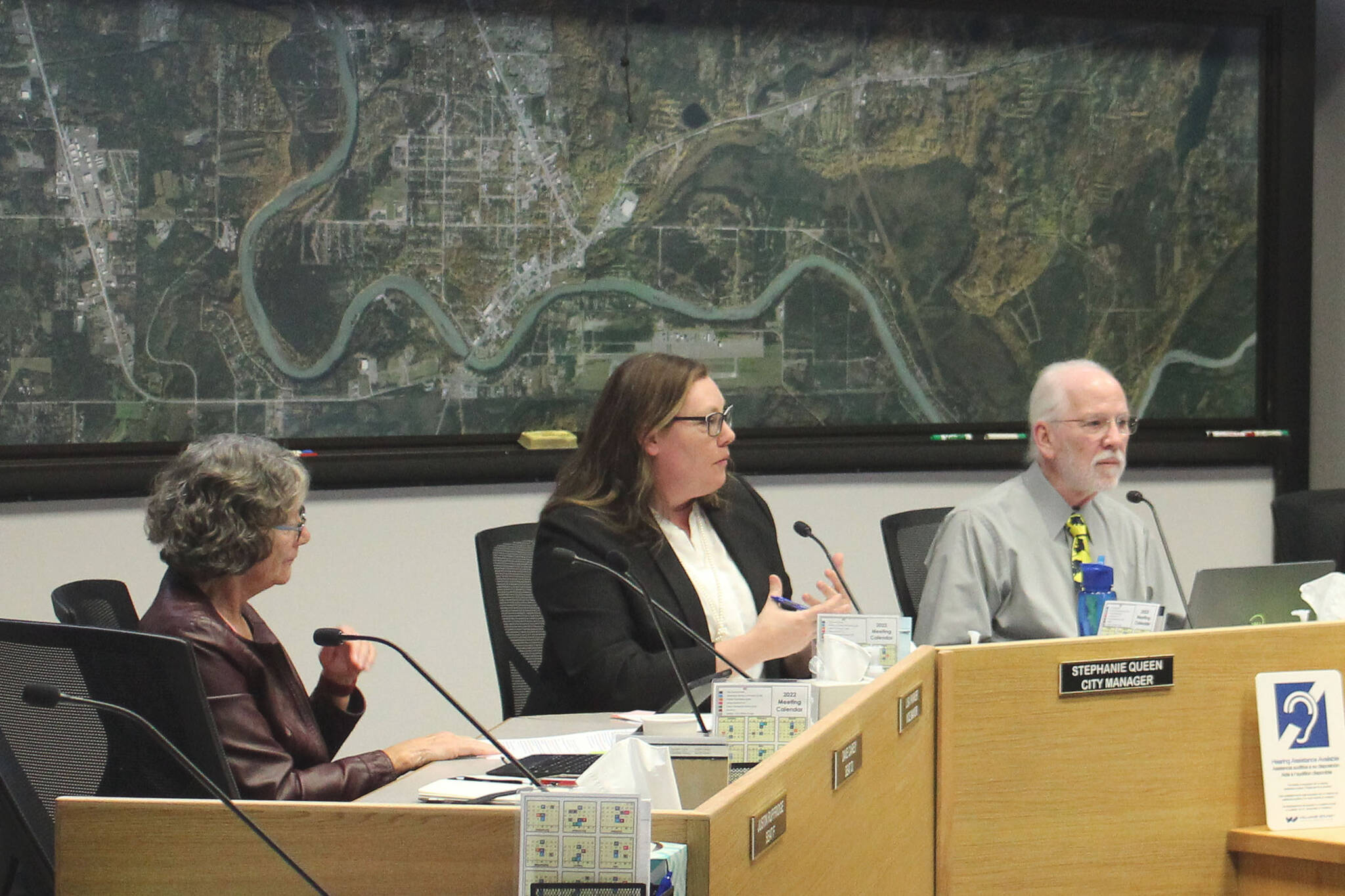 Soldotna City Manager Stephanie Queen (center) speaks during a meeting of the Soldotna City Council on Wednesday, April 13, 2022, in Soldotna, Alaska. (Ashlyn O’Hara/Peninsula Clarion)