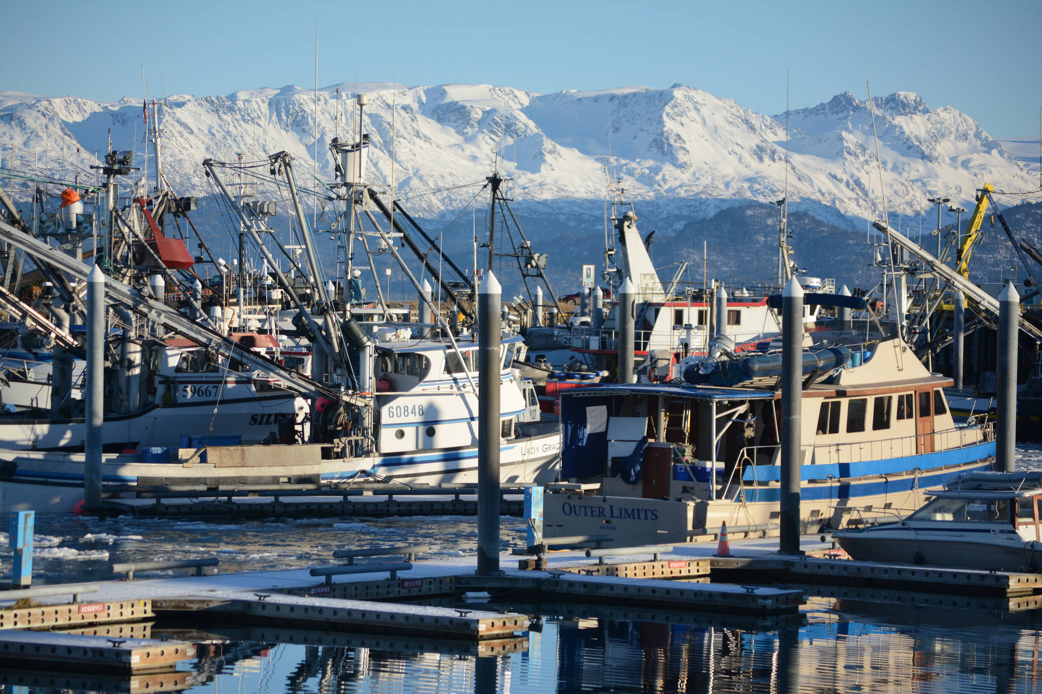 Commercial fishing and other boats are moored in the Homer Harbor in this file photo. (Photo by Michael Armstrong/Homer News)