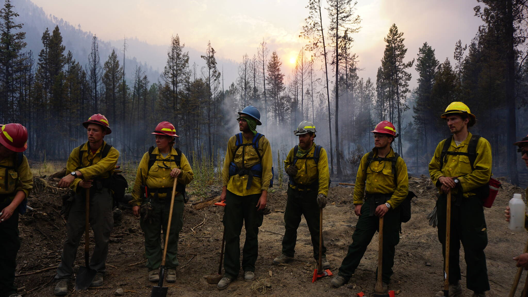 Courtesy photo / Parker Anders
A Forest Service fire crew gets brief during an operation. Fire crews from Alaska are frequently deployed to the Lower 48 to help combat wildfires that are growing larger and closer to urban areas in many cases.