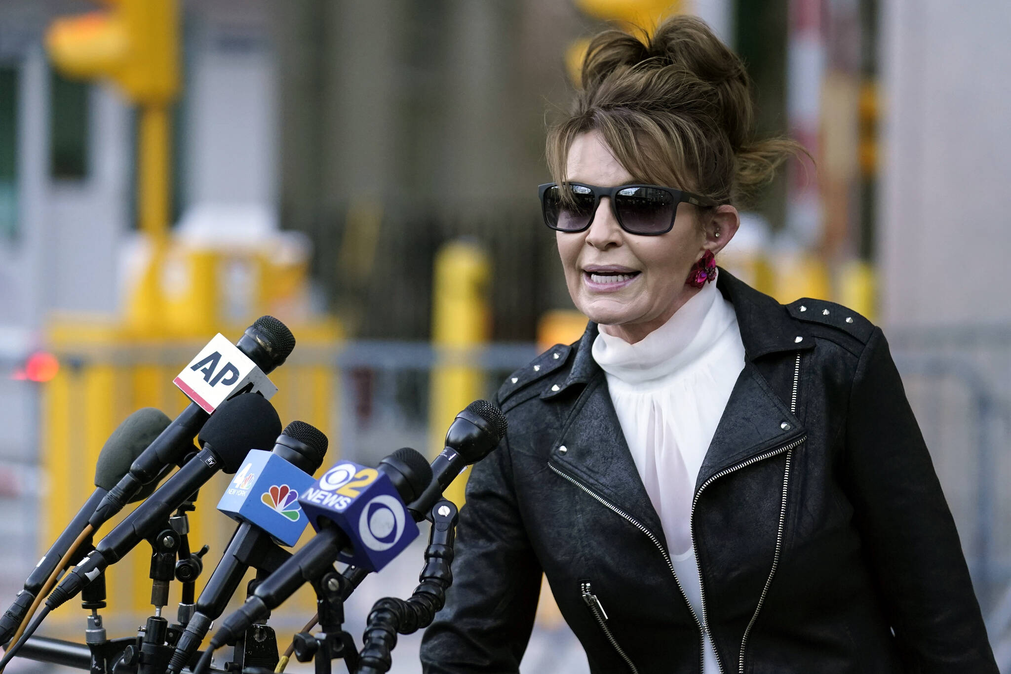 Former Alaska Gov. Sarah Palin speaks briefly to reporters as she leaves a courthouse in New York, Feb. 14, 2022. Palin is one of 48 candidates for Alaska’s lone U.S. House seat, which was held for decades by Republican Rep. Don Young, who died last month. Palin says she’s serious about the run though some critics have questioned her motivations. (AP Photo/Seth Wenig, File)