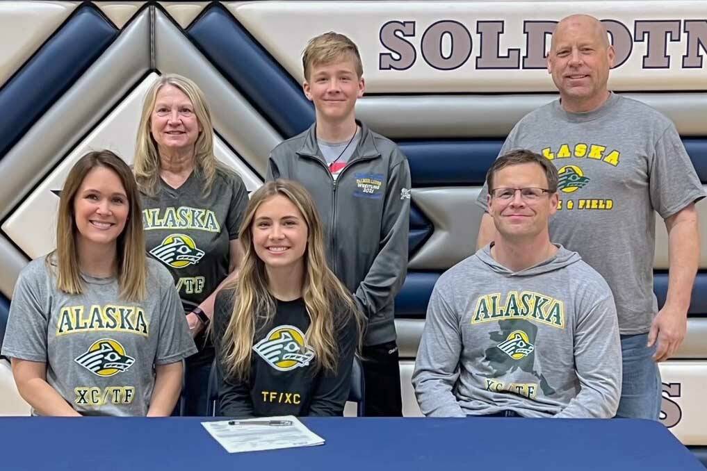 SoHi senior Jordan Strausbaugh signed a National Letter of Intent on Thursday, April 21, 2022, to run long distance at the University of Alaska Anchorage. In front are Jordan's mother, Susie; Jordan; and Jordan's father, Heath. In back are Jordan's grandmother, Tammy; Jordan's brother, Jacob; and Jordan's grandfather, Kurt. (Photo provided)