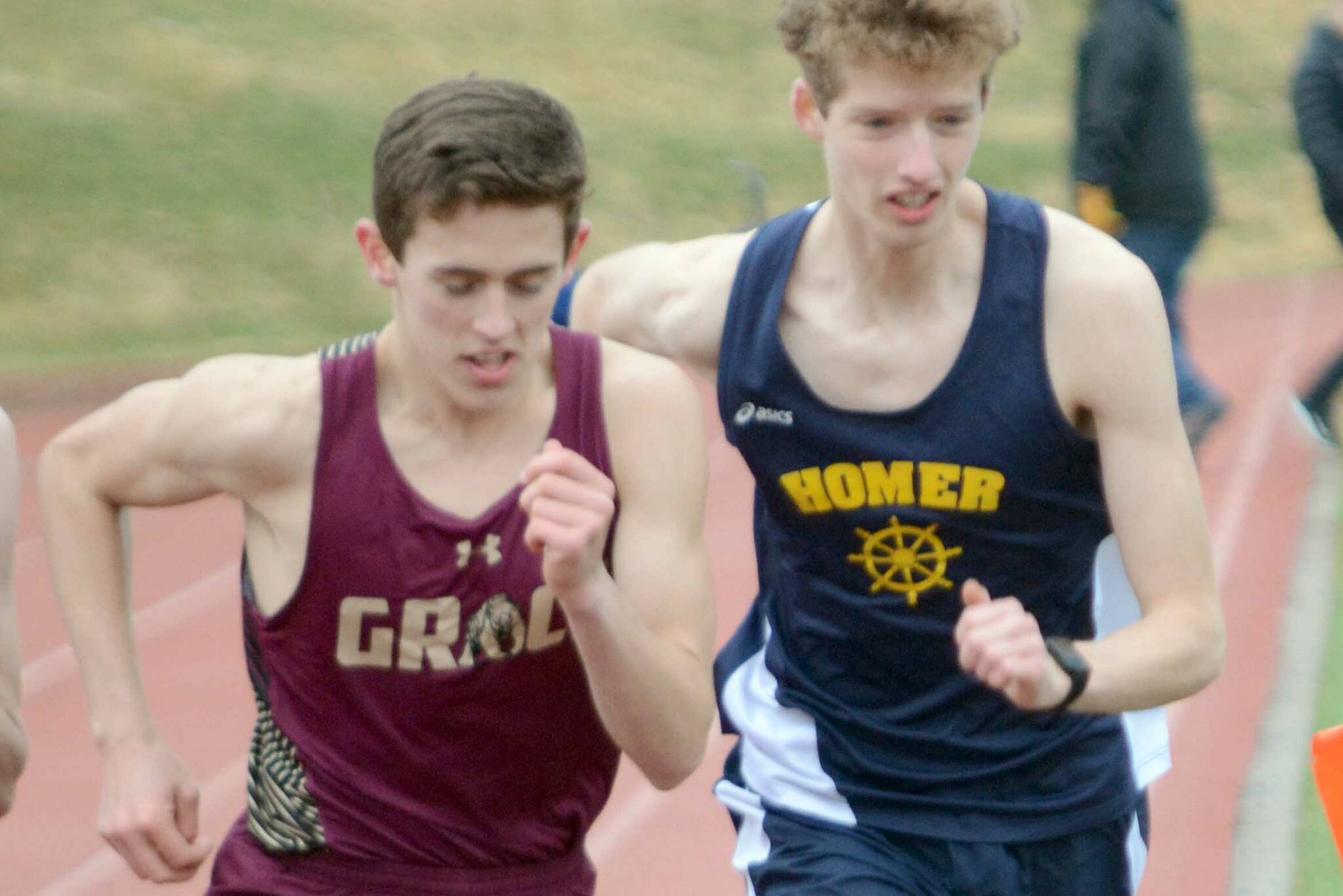 Homer's Seamus McDonough, right, starts the 600-meter event on Saturday, April 23, 2022, for the Homer Invite at Homer High School in Homer, Alaska. (Photo by Michael Armstrong/Homer News)
