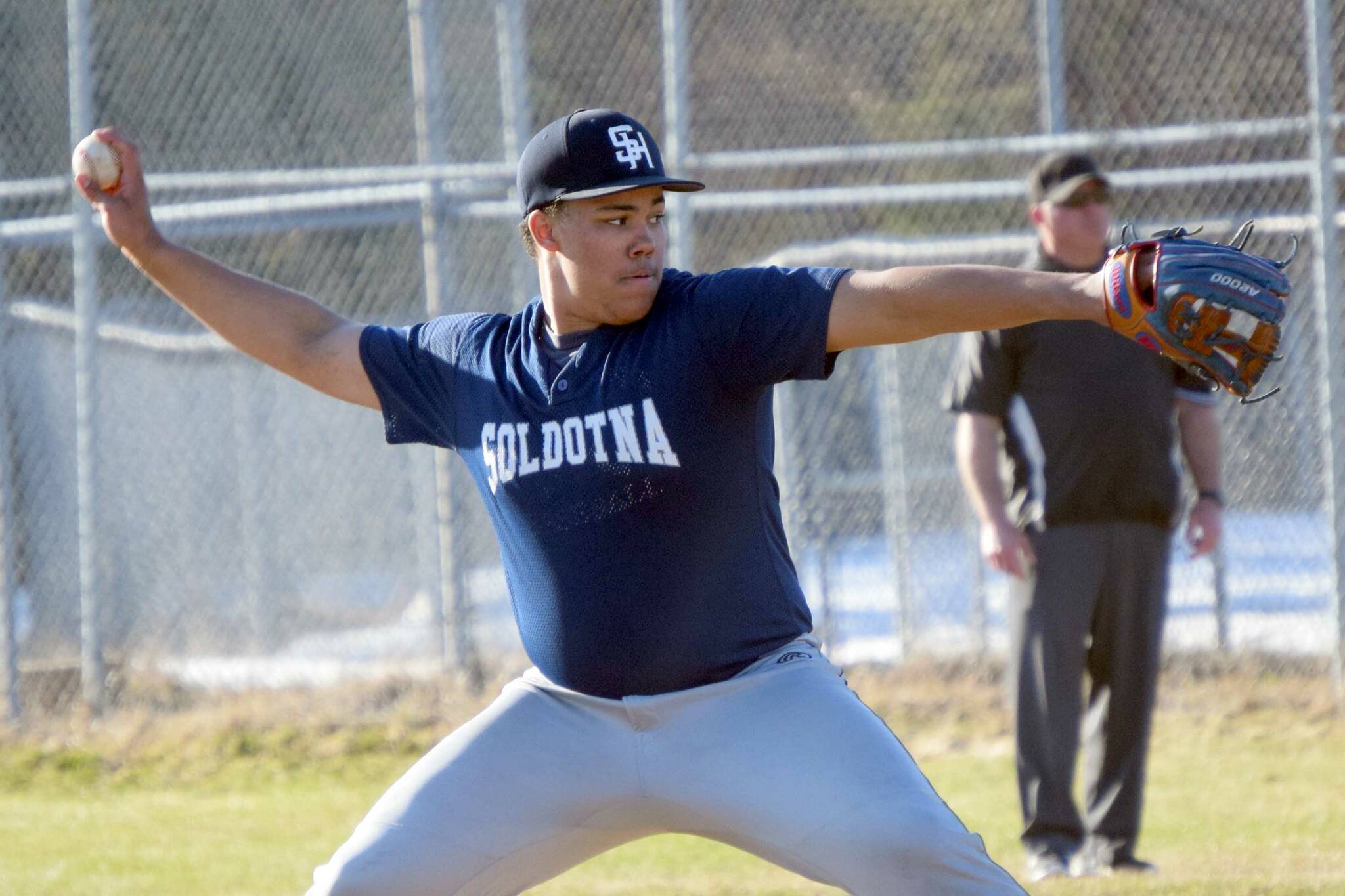 Soldotna starting pitcher Atticus Gibson delivers to Kenai Central on Tuesday, April 26, 2022, at the Kenai Little League Fields in Kenai, Alaska. (Photo by Jeff Helminiak/Peninsula Clarion)