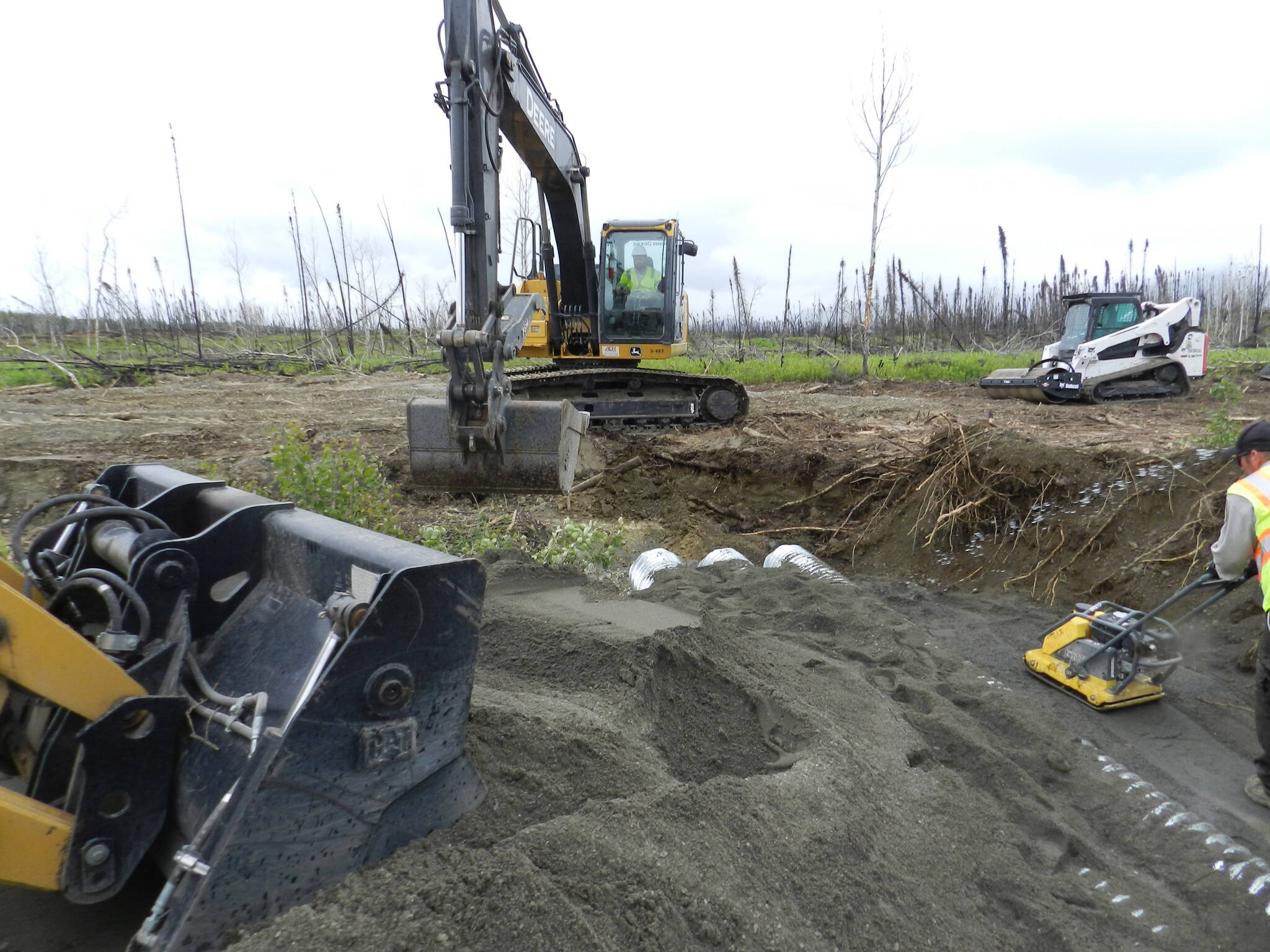 Installation of culverts in Kelly Lake Road. (Photo provided by FWS)