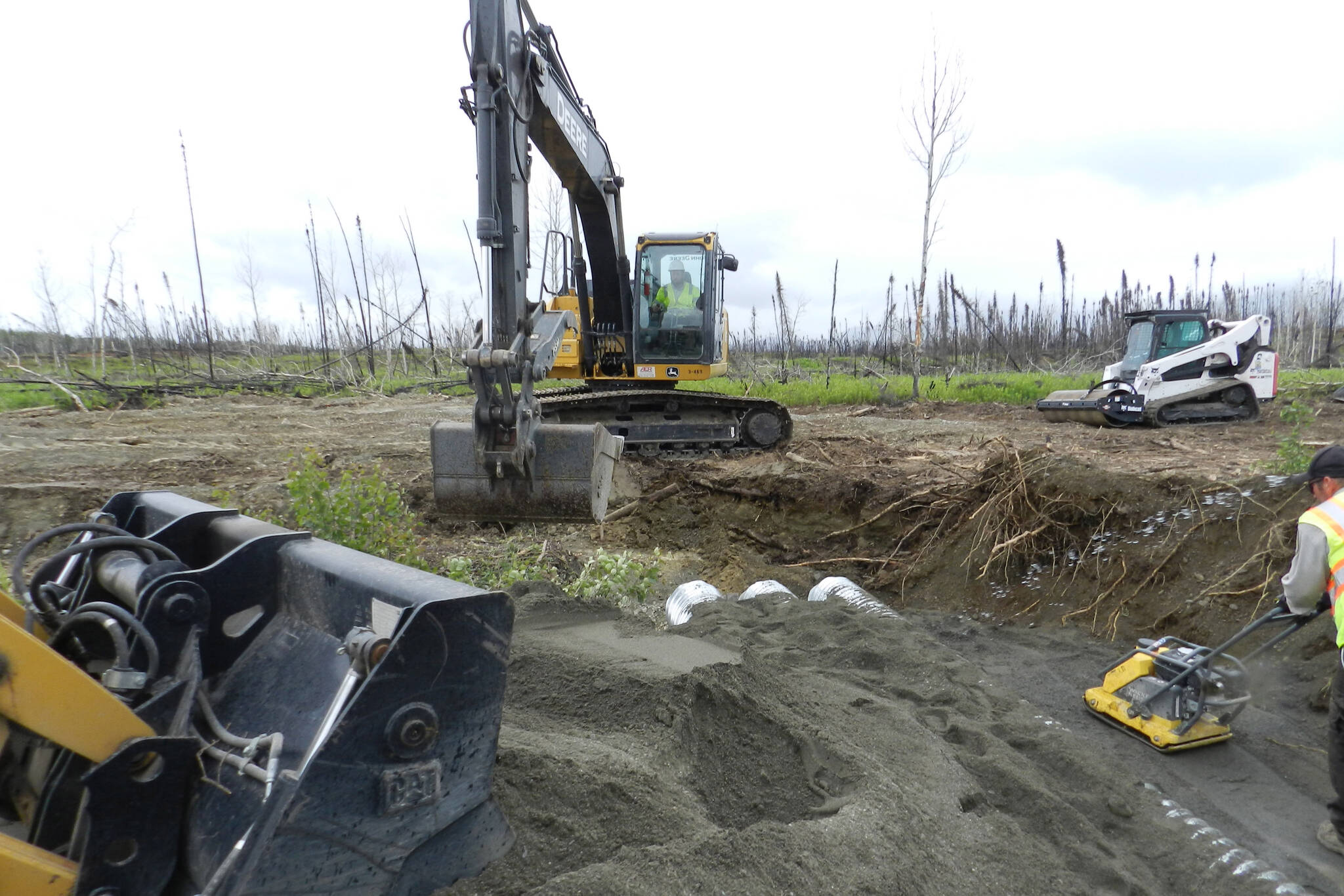 Installation of culverts in Kelly Lake Road. (Photo provided by FWS)