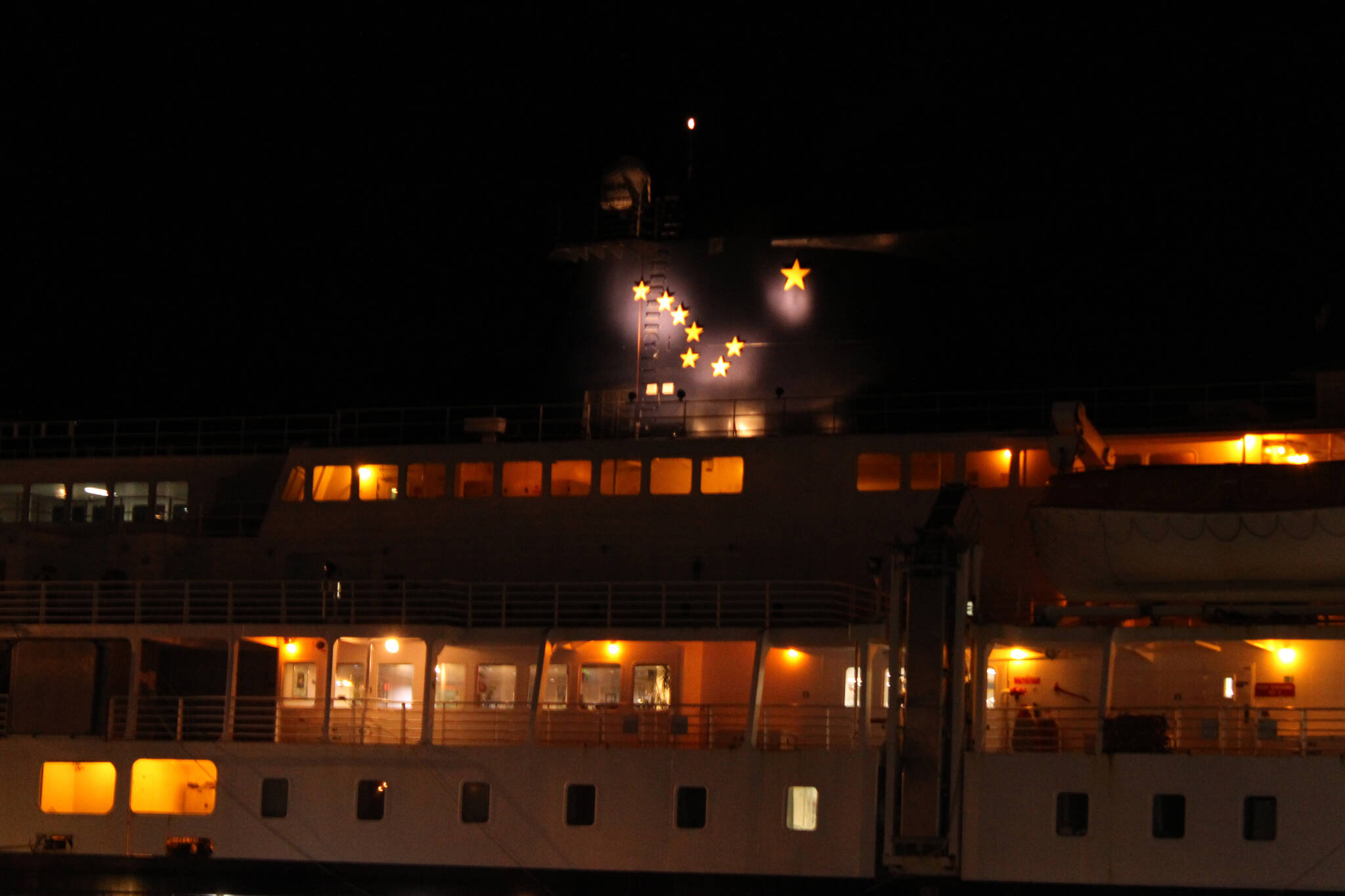 This October 2020 photo shows the pattern of the Alaska state flag illuminated on the M/V Kennicott. (Ben Hohenstatt / Juneau Empire File)