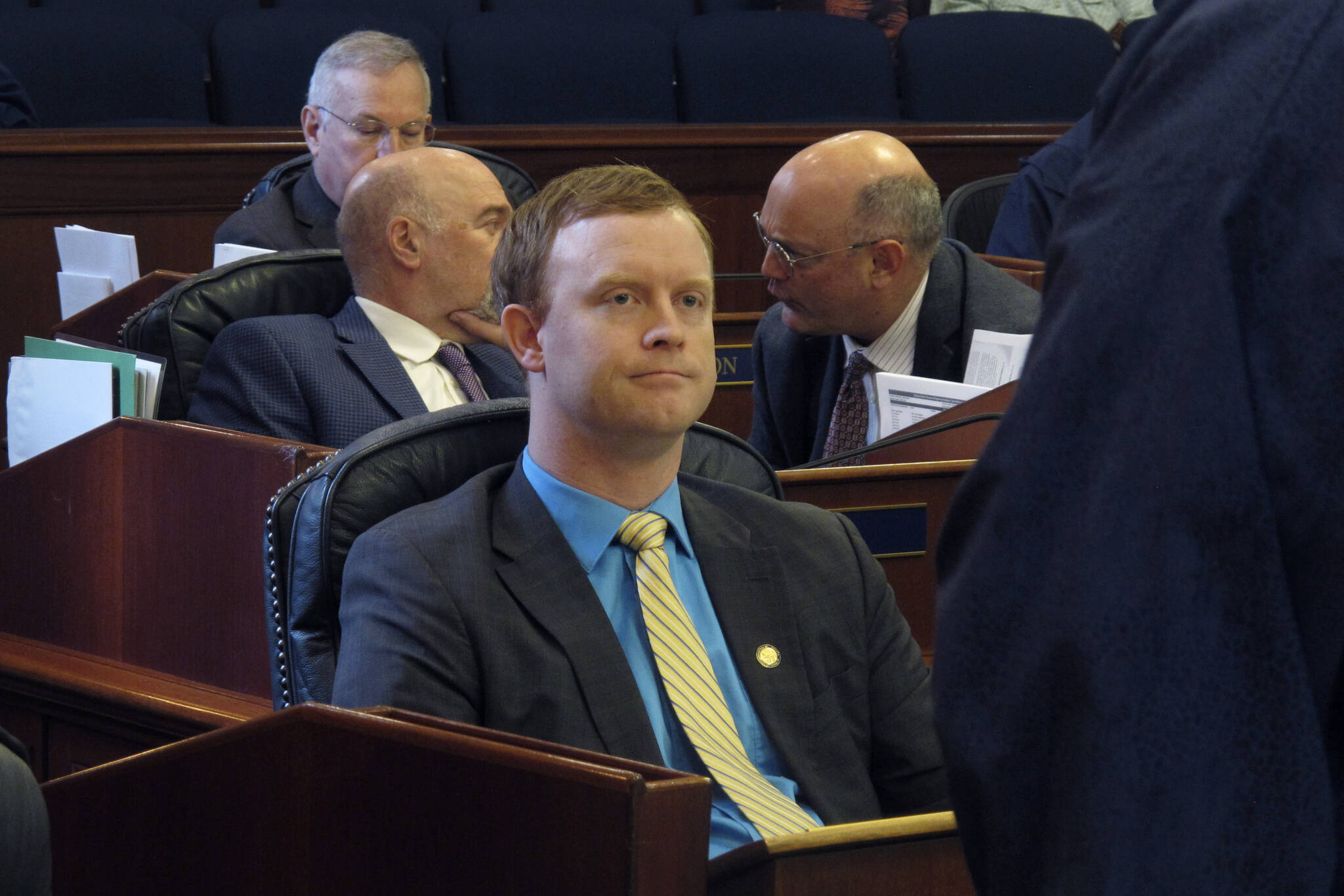 Alaska state Rep. David Eastman, a Wasilla Republican, is shown seated on the House floor on Friday, April 29, 2022, in Juneau, Alaska. Minority House Republicans removed Eastman from their caucus, with the minority leader citing a buildup of issues over time. (AP Photo/Becky Bohrer)