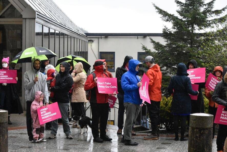 Protesters gather near the Alaska State Capitol on May 3, 2022, following a leaked draft of a Supreme Court decision that would overturn the landmark case Roe v. Wade. (Peter Segall/Juneau Empire)