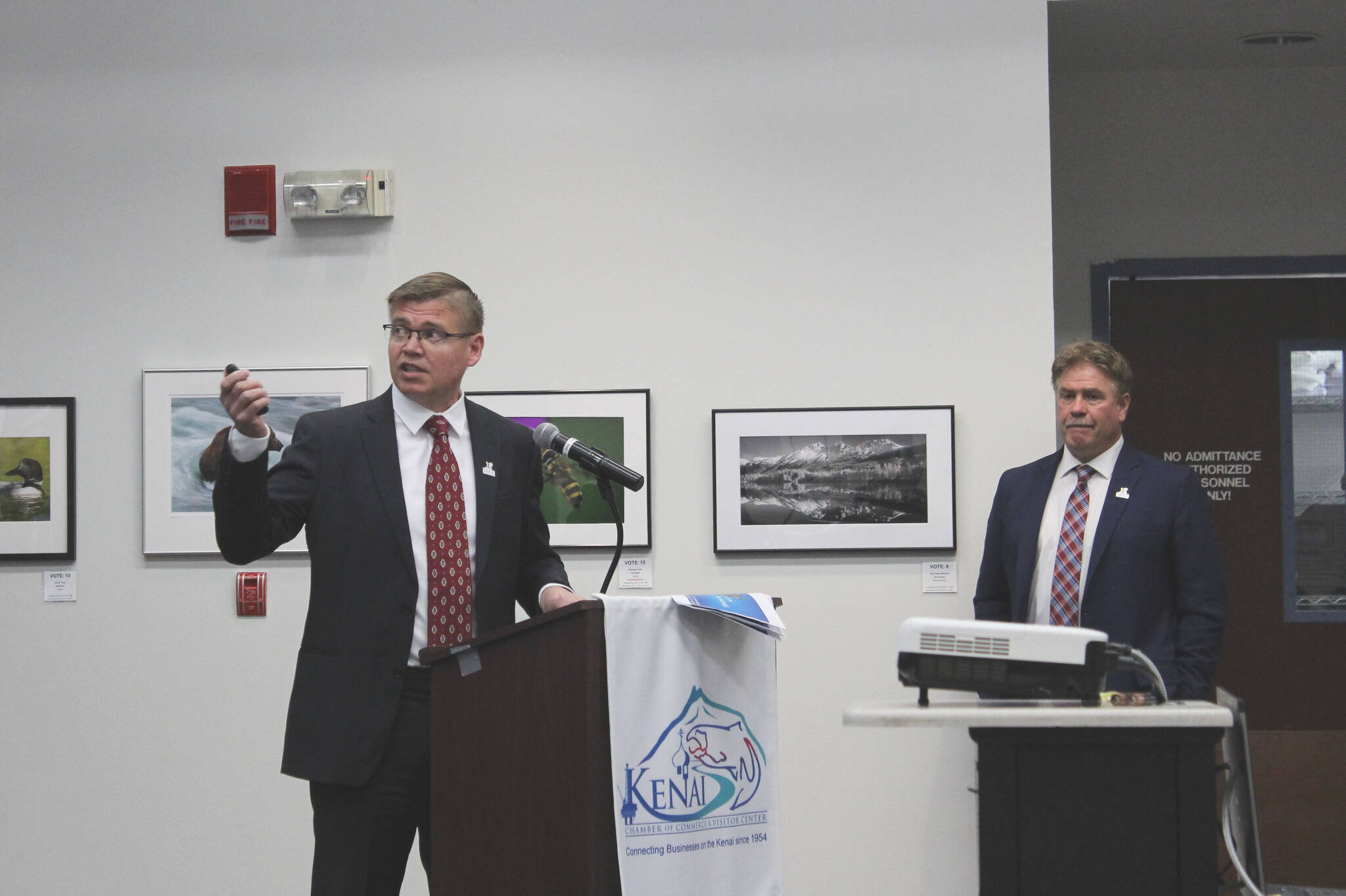 Kenai City Manager Paul Ostrander, left, speaks during a “State of the City” address while Kenai Mayor Brian Gabriel looks on at the Kenai Chamber of Commerce and Visitor Center on Wednesday, May 4, 2022 in Kenai, Alaska. (Ashlyn O’Hara/Peninsula Clarion)