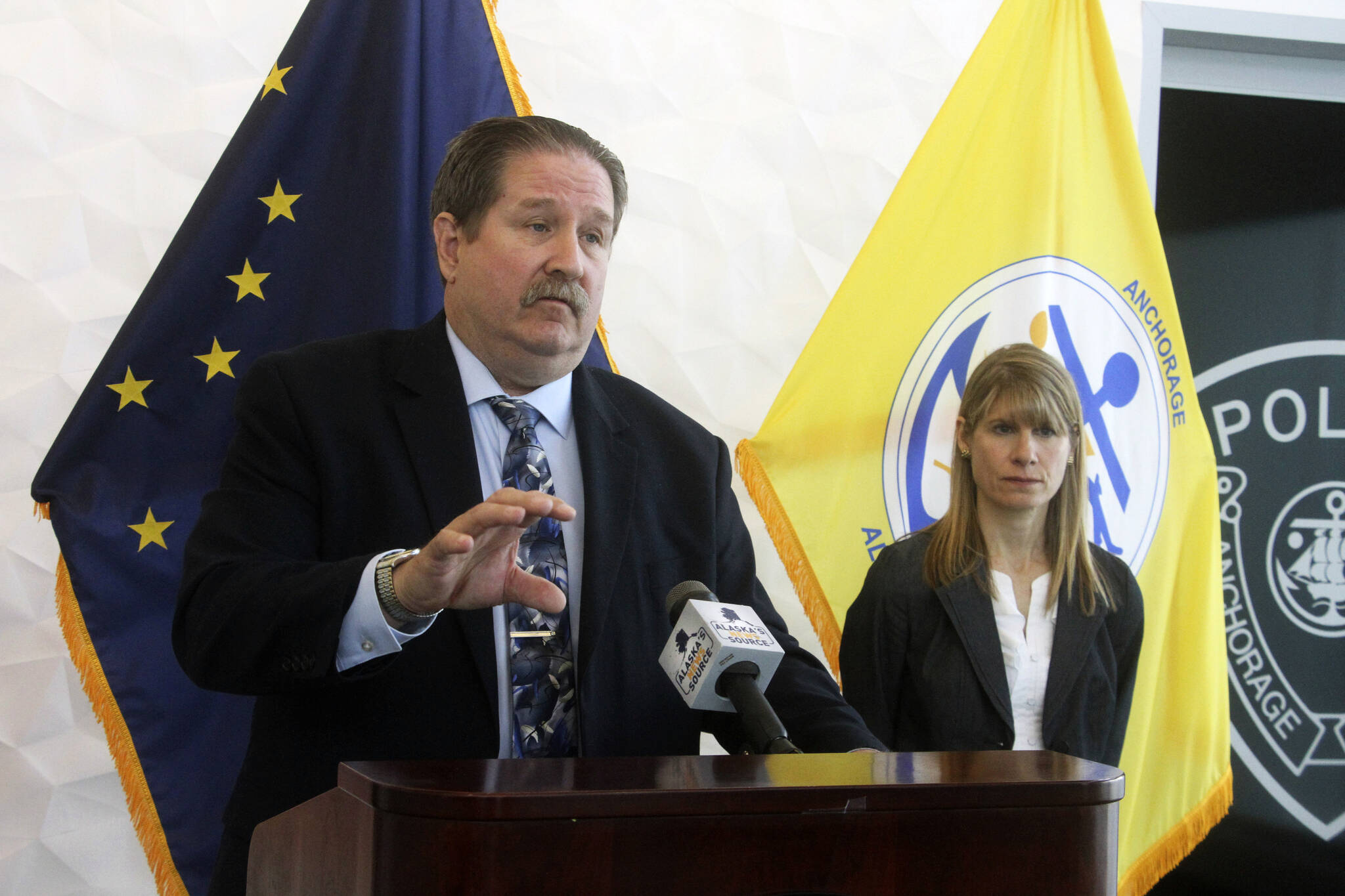 Anchorage Police Det. Dave Cordie, left, addresses reporters Thursday, May 5, 2022, in Anchorage, Alaska, about the disappearance nine years ago of a 6-year-old boy and hopes that the public will provide new leads on the whereabouts of Deshawn McCormick. On the right is attorney Rachel Gernat with the Office of Special Prosecutions, which provides legal assistance to the police on cold cases. (AP Photo/Mark Thiessen)