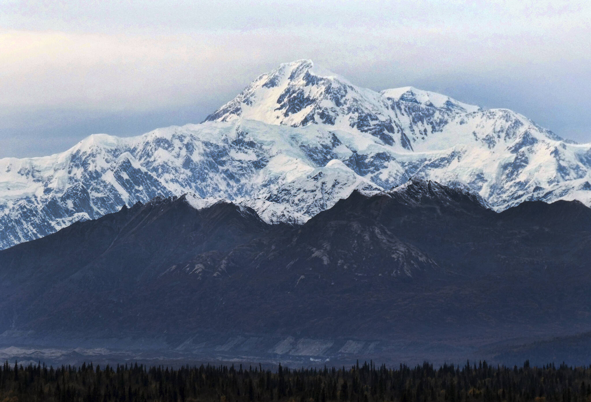 In this Oct. 1, 2017, photo, North America’s tallest peak, Denali, is seen from a turnout in Denali State Park, Alaska. National park rangers in Alaska on Friday, May 6, 2022, resumed an aerial search for the year’s first registered climber on North America’s tallest peak after he didn’t check in with a friend. (AP Photo/Becky Bohrer, File)