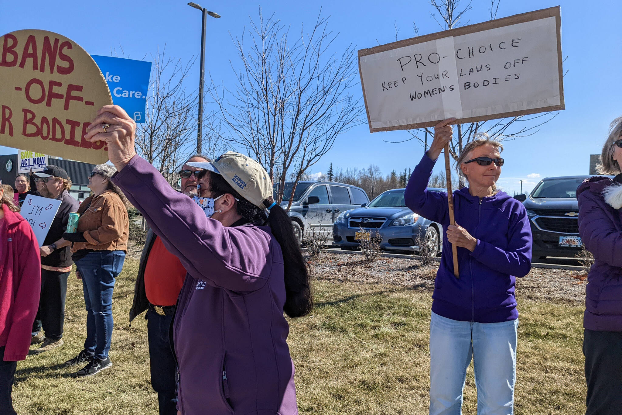 Demonstrators in support of abortion rights stand at the intersection of the Kenai and Sterling highways on Saturday, May 7, 2022, in Soldotna, Alaska. (Photo by Erin Thompson/Peninsula Clarion)