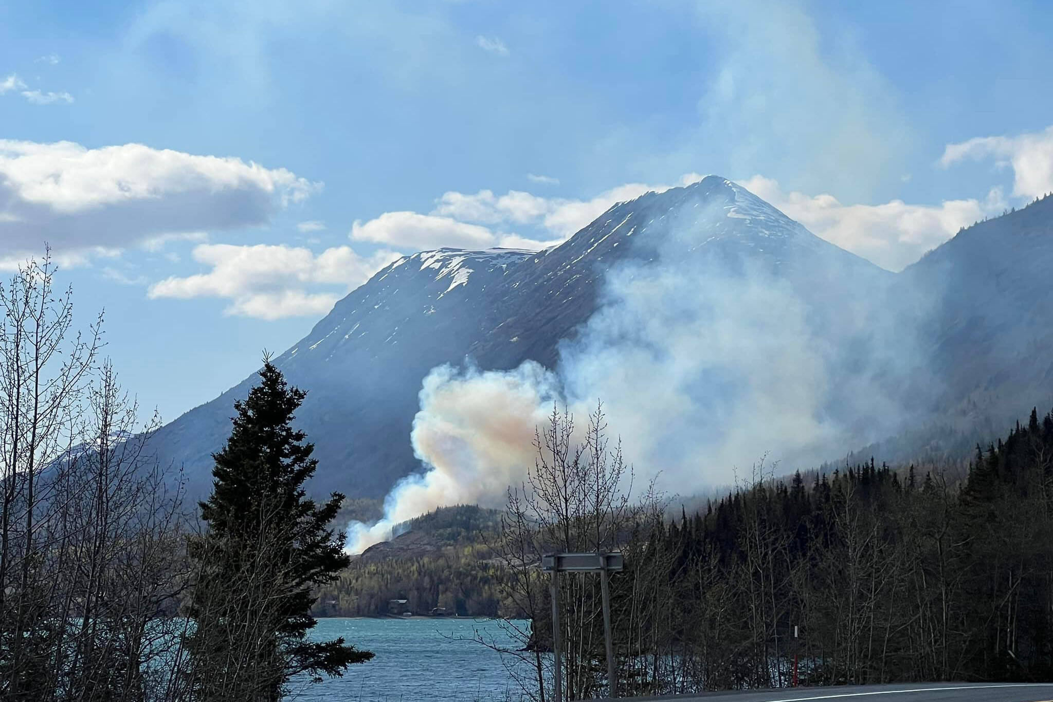 A wildfire burns near Milepost 46.5 of the Sterling Highway on Tuesday, May 10, 2022 near Cooper Landing, Alaska. (Photo courtesy Cooper Landing Emergency Services)