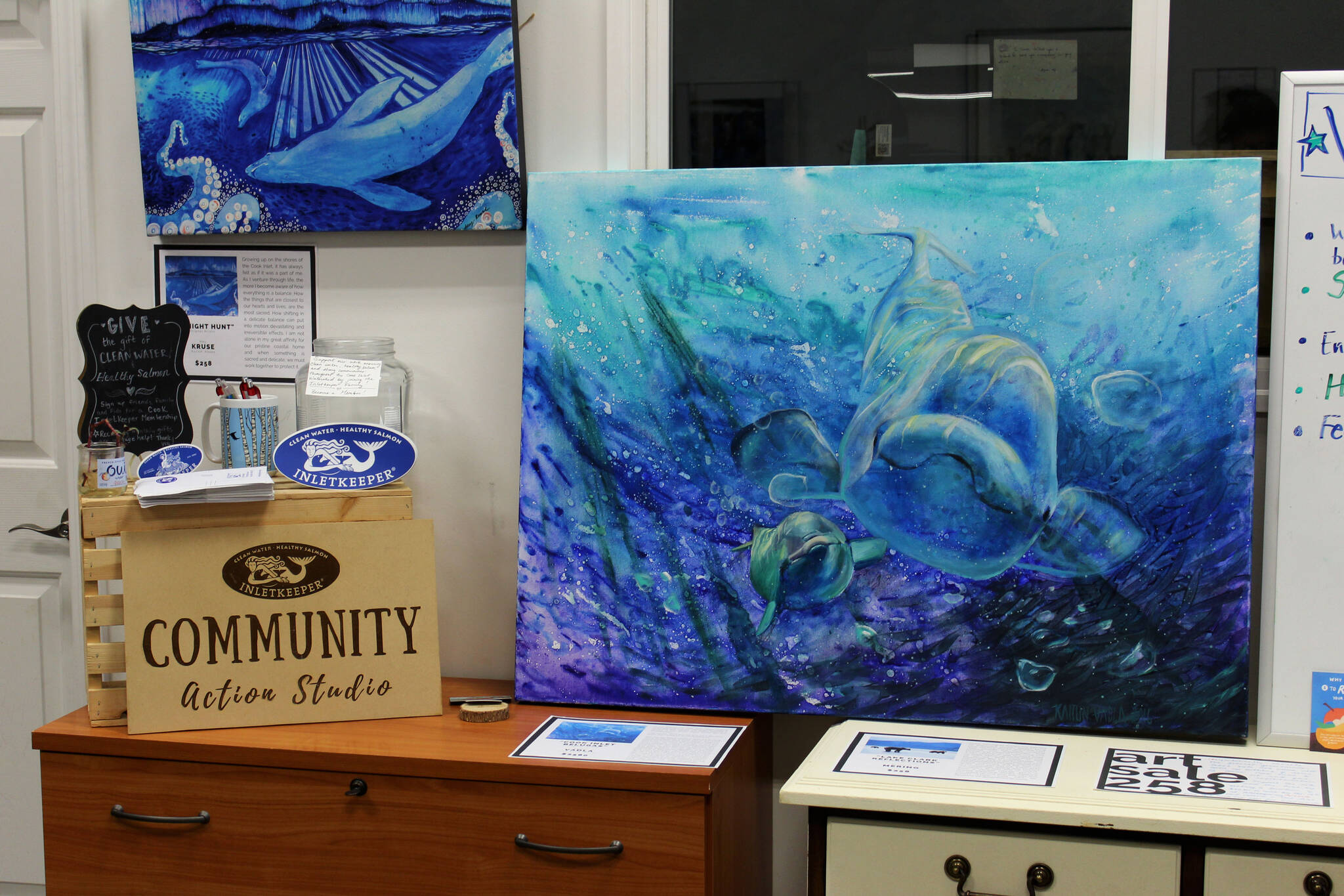 Artwork is displayed as part of "ART Sale 258" at the Cook Inletkeeper Community Action Studio on Thursday, Dec. 9, 2021 in Soldotna, Alaska. (Ashlyn O’Hara/Peninsula Clarion)