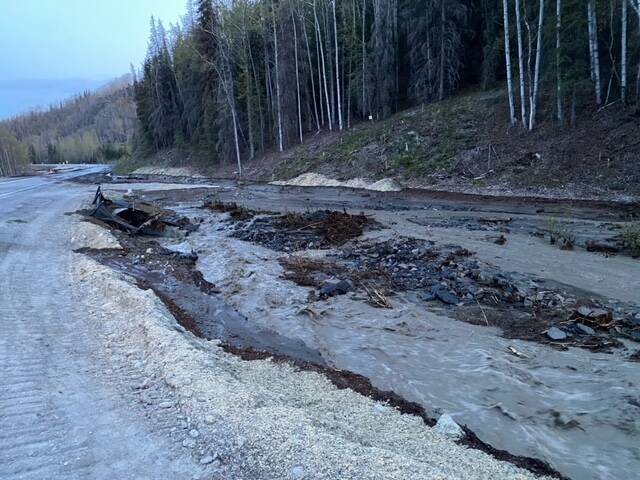 Water and debris cover the Sterling Highway near Cooper Landing on Thursday, May 12, 2022 near Cooper Landing, Alaska. (Photo courtesy Alaska Department of Transportation and Public Facilities)