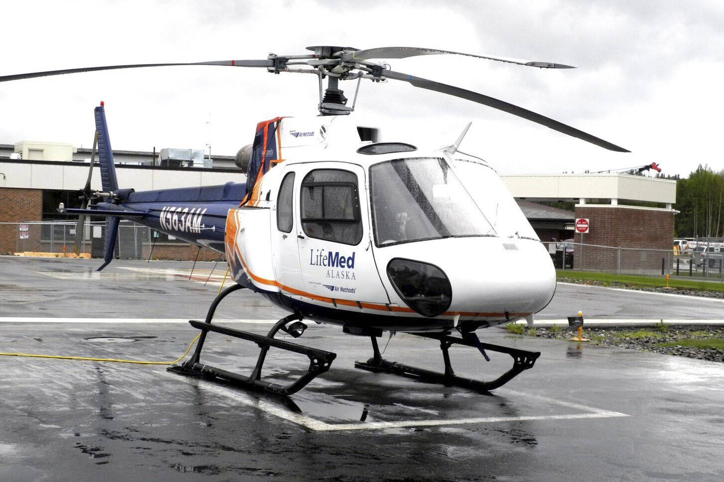 A LifeMed helicopter waits on June 10, 2014, at Central Peninsula Hospital in Soldotna, Alaska. The author took a medevac flight in May 2013 in a similar helicopter. (Photo by Michael Armstrong/Homer News)