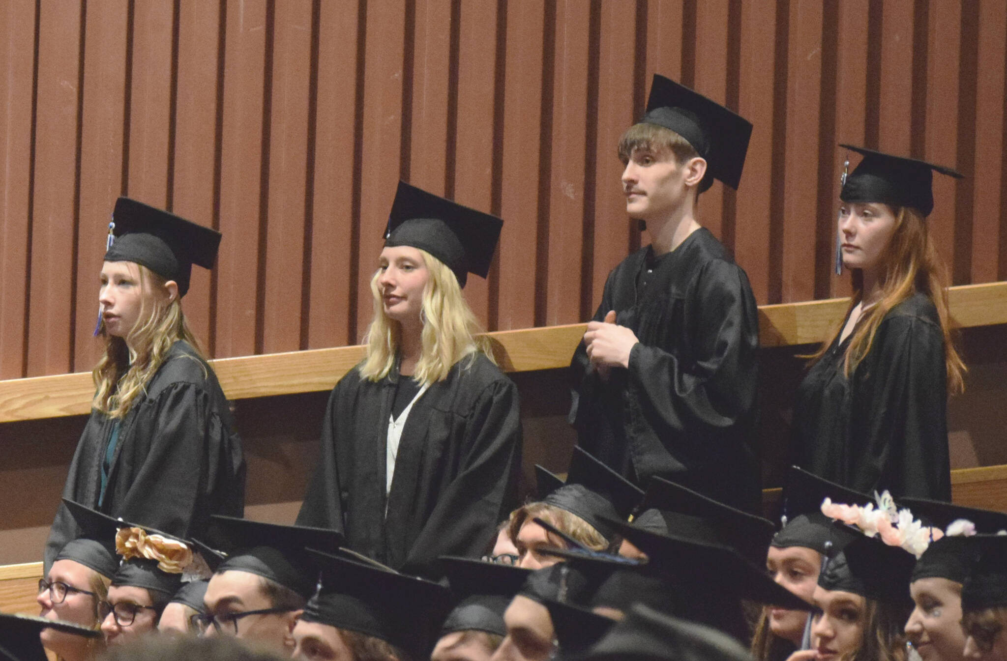 Graduates wait to receive diplomas during Connections Homeschool’s commencement ceremony on Thursday, May 19, 2022, in Soldotna, Alaska. (Ashlyn O’Hara/Peninsula Clarion)