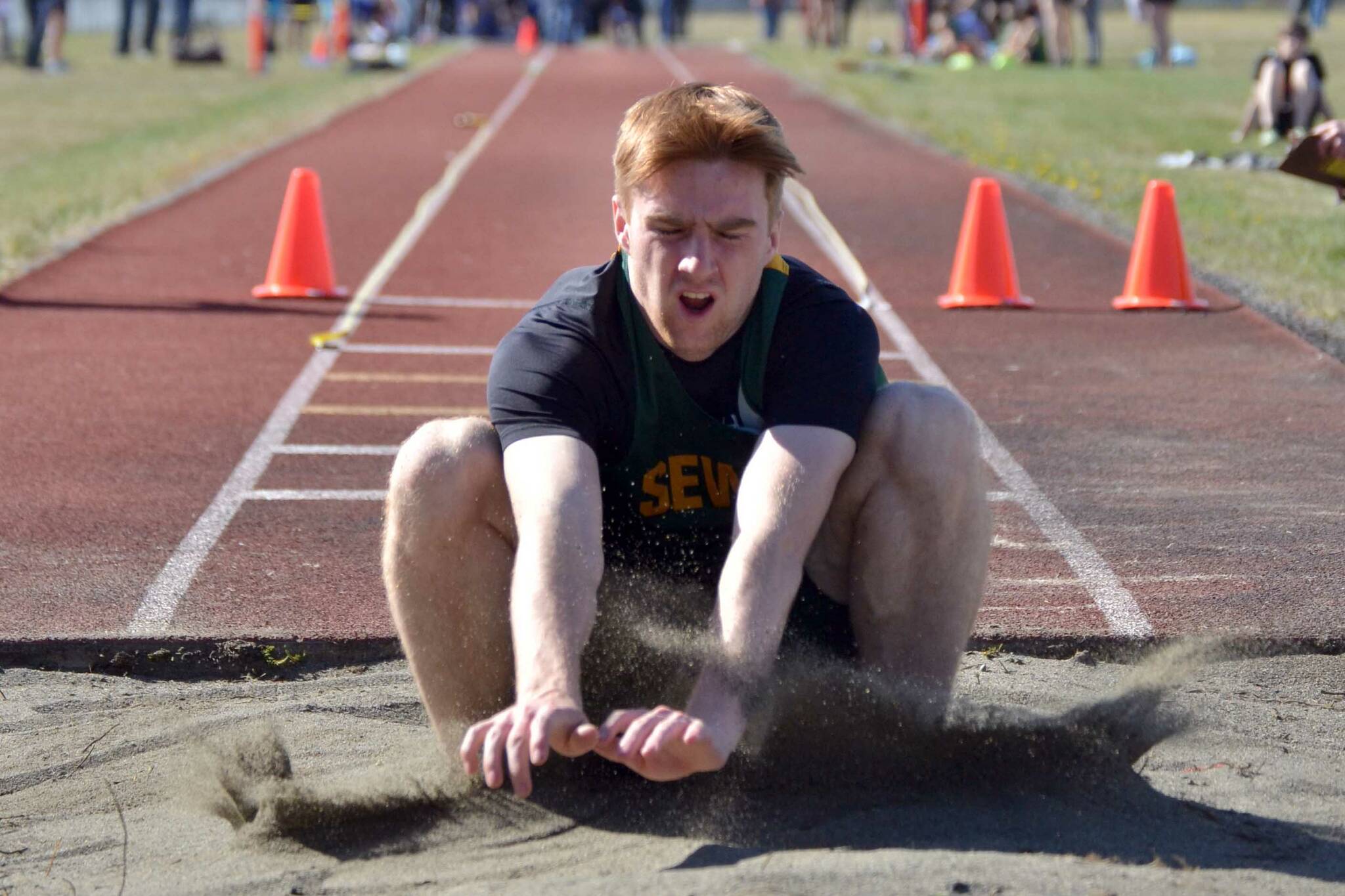 Seward's Tommy Cronin competes in the triple jump at the Region 3/Division II meet Friday, May 20, 2022, at Ed Hollier Field at Kenai Central High School in Kenai, Alaska. (Photo by Jeff Helminiak/Peninsula Clarion)