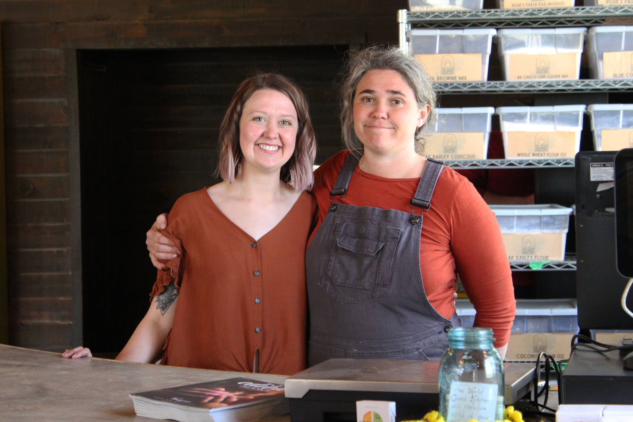 Anastasia Scollon (left) and Willow King (right) stand in The Goods + Sustainable Grocery and Where it’s At mindful food and drink on Monday, May 16, 2022 in Soldotna, Alaska. (Ashlyn O’Hara/Peninsula Clarion)