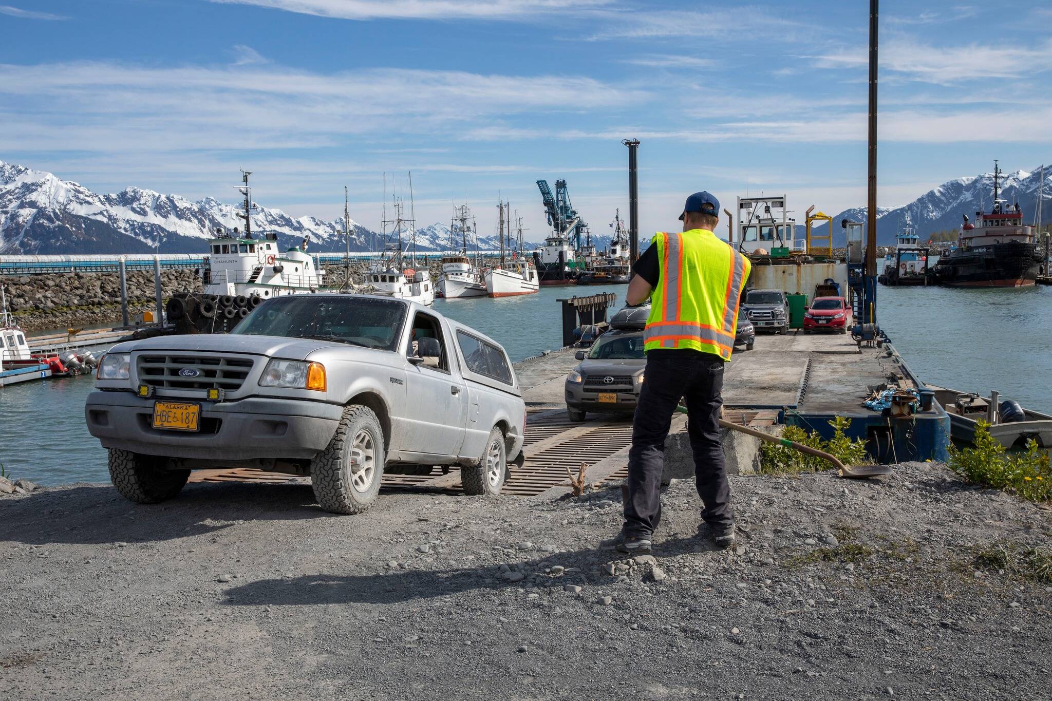 Vehicles are unleaded at the Seward Harbor after being moved from Lowell Point on Sunday, May 22, 2022 in Seward, Alaska. (Photo courtesy Kenai Peninsula Borough Office of Emergency Management)