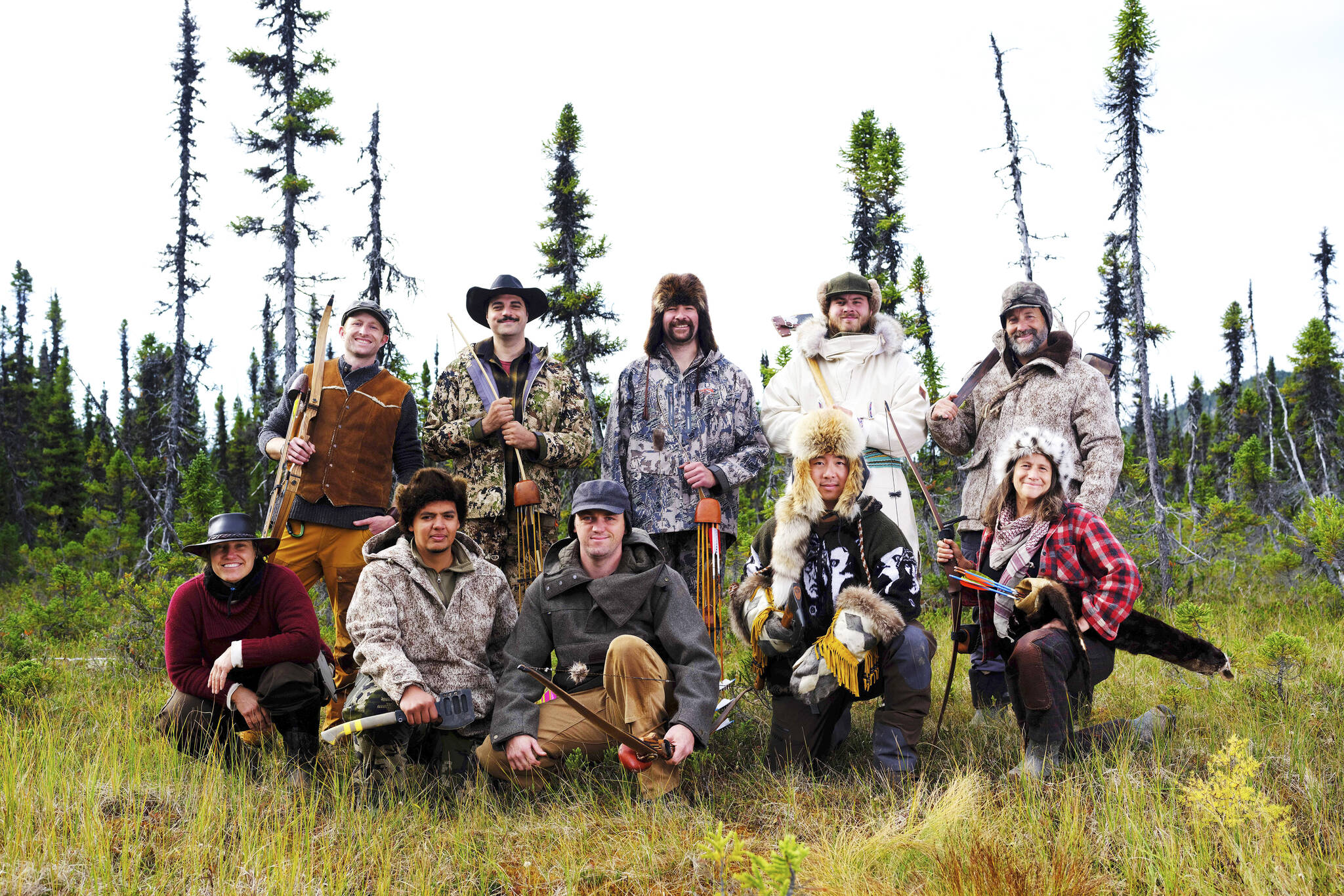 The 10 participants in season 9 of “Alone,” premiering on May 26, 2022, on the History Channel. Terry Burns of Homer is the third from left, back. Another Alaskan in the series, Jacques Tourcotte of Juneau, is the fourth from left, back. (Photo by Brendan George Ko/History Channel)