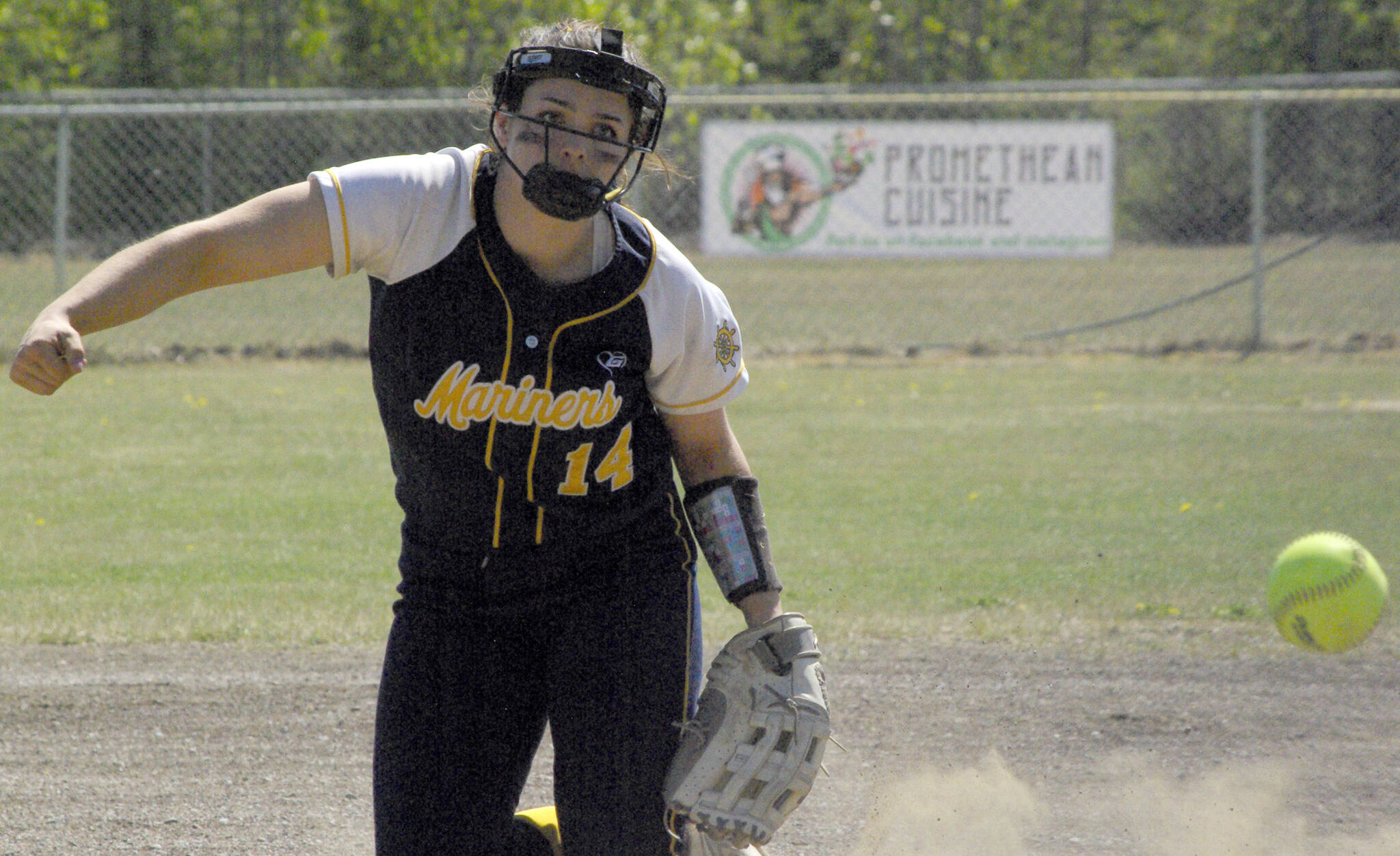 Homer’s Zoe Adkins pitches to Palmer on Friday, May 27, 2022, at the Northern Lights Conference tournament at the Soldotna Little League fields in Soldotna, Alaska. (Photo by Jeff Helminiak/Peninsula Clarion)