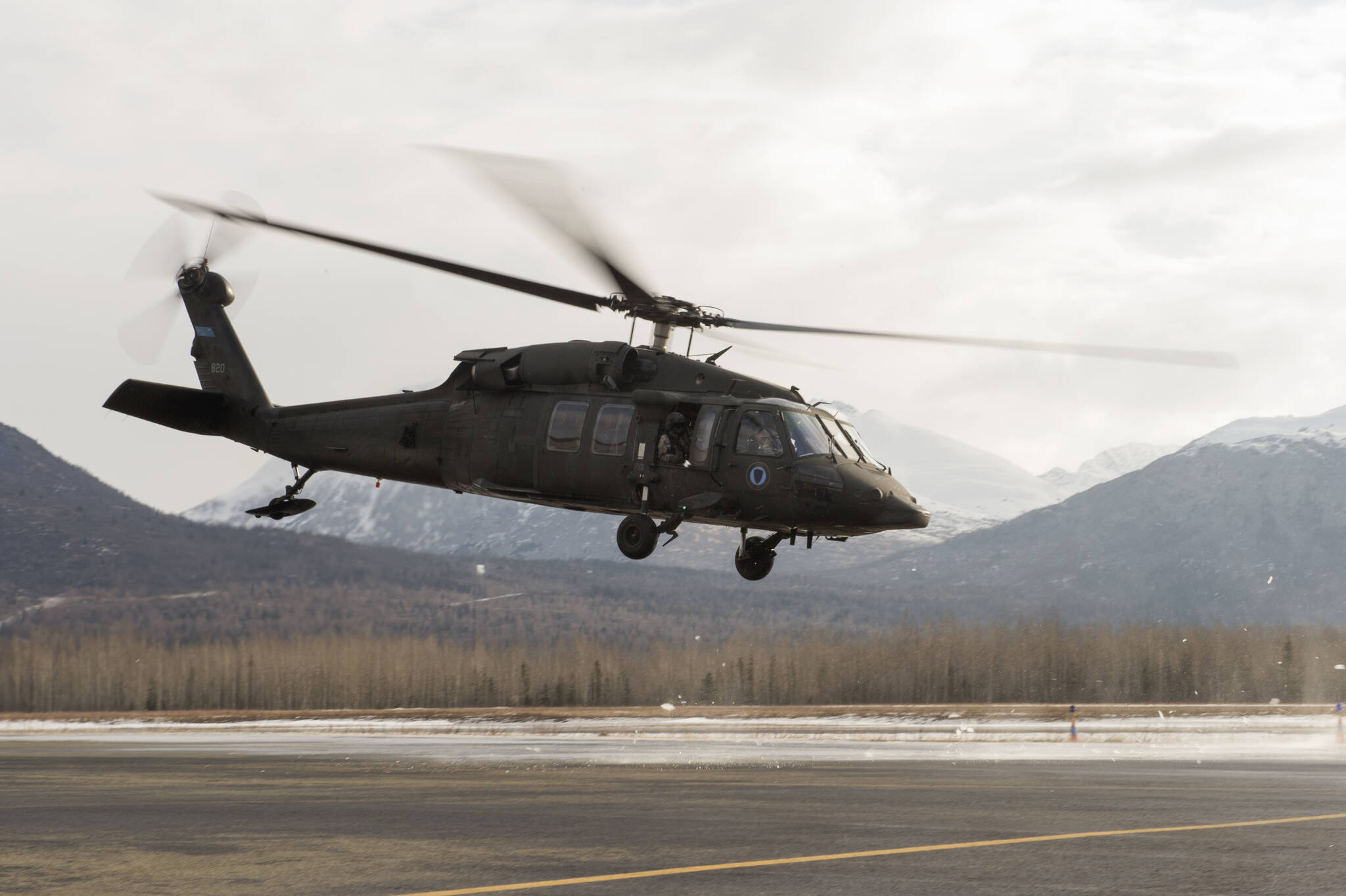 An Alaska Army National Guard aircrew flying a UH-60 Black Hawk aided in the rescue of a mountain biker with a possible spinal injury from the wilderness near Cooper Landing on May 30, 2022. (Alejandro Pena / U.S. Air Force)