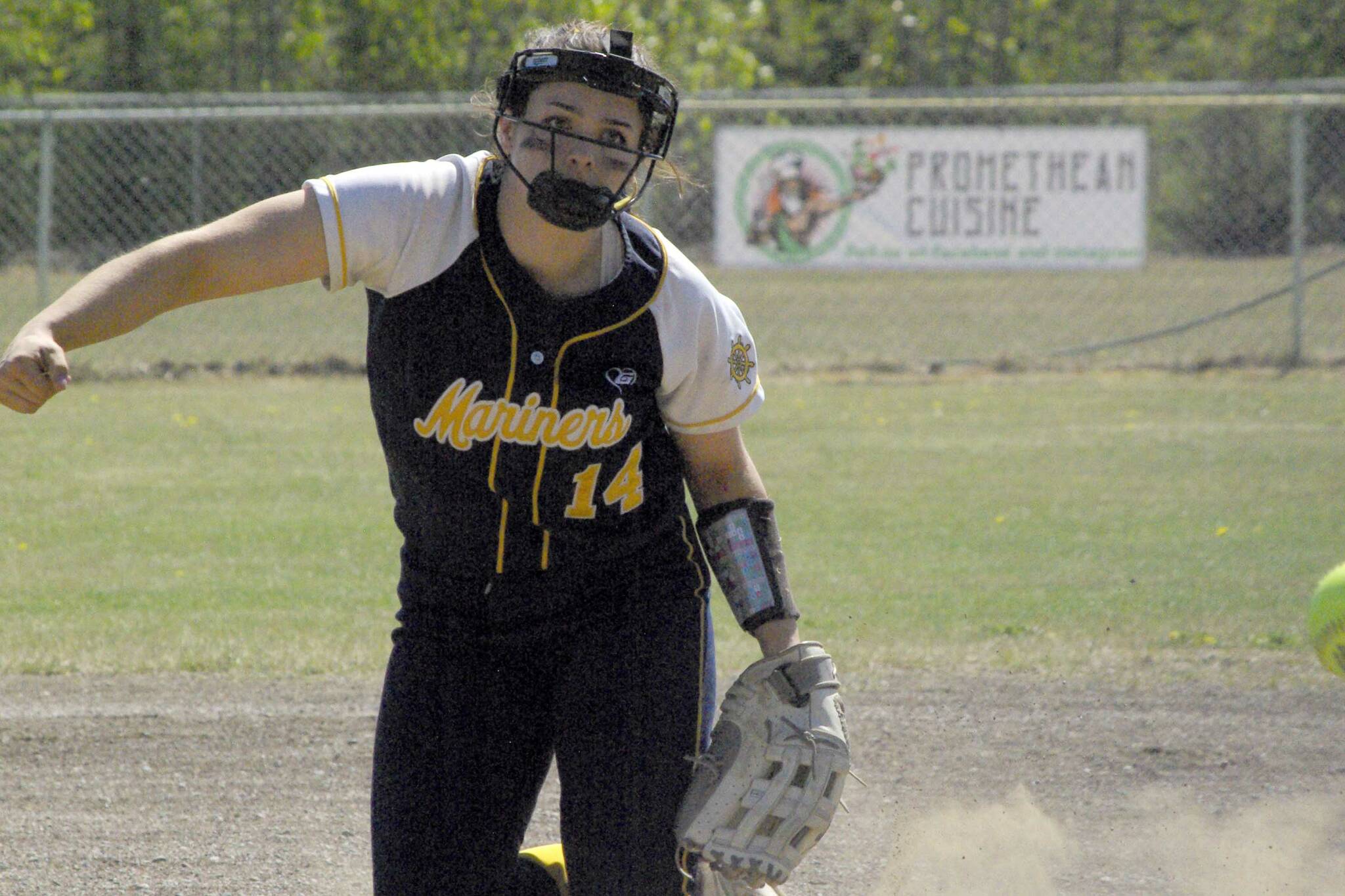 Homer’s Zoe Adkins pitches to Palmer on Friday, May 27, 2022, at the Northern Lights Conference tournament at the Soldotna Little League fields in Soldotna, Alaska. (Photo by Jeff Helminiak/Peninsula Clarion)