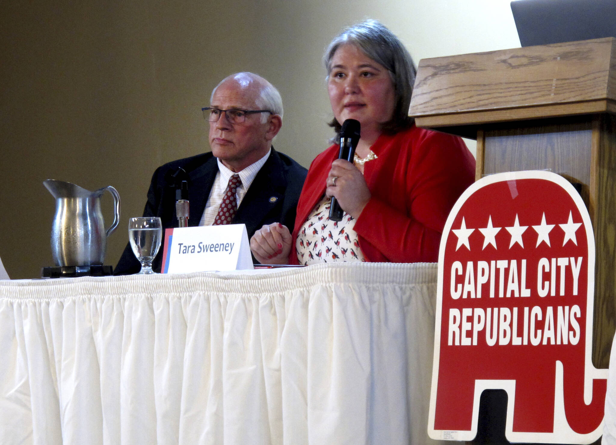 Republican Tara Sweeney, right, speaks Monday, May 16, 2022, at a forum in Juneau, Alaska, that was also attended by three other Republican candidates for Alaska’s U.S. House seat, including John Coghill, left. Sweeney and Coghill are among 48 candidates in a June 11 special primary for the House seat left vacant by the death earlier this year of Republican Rep. Don Young. (AP Photo/Becky Bohrer)