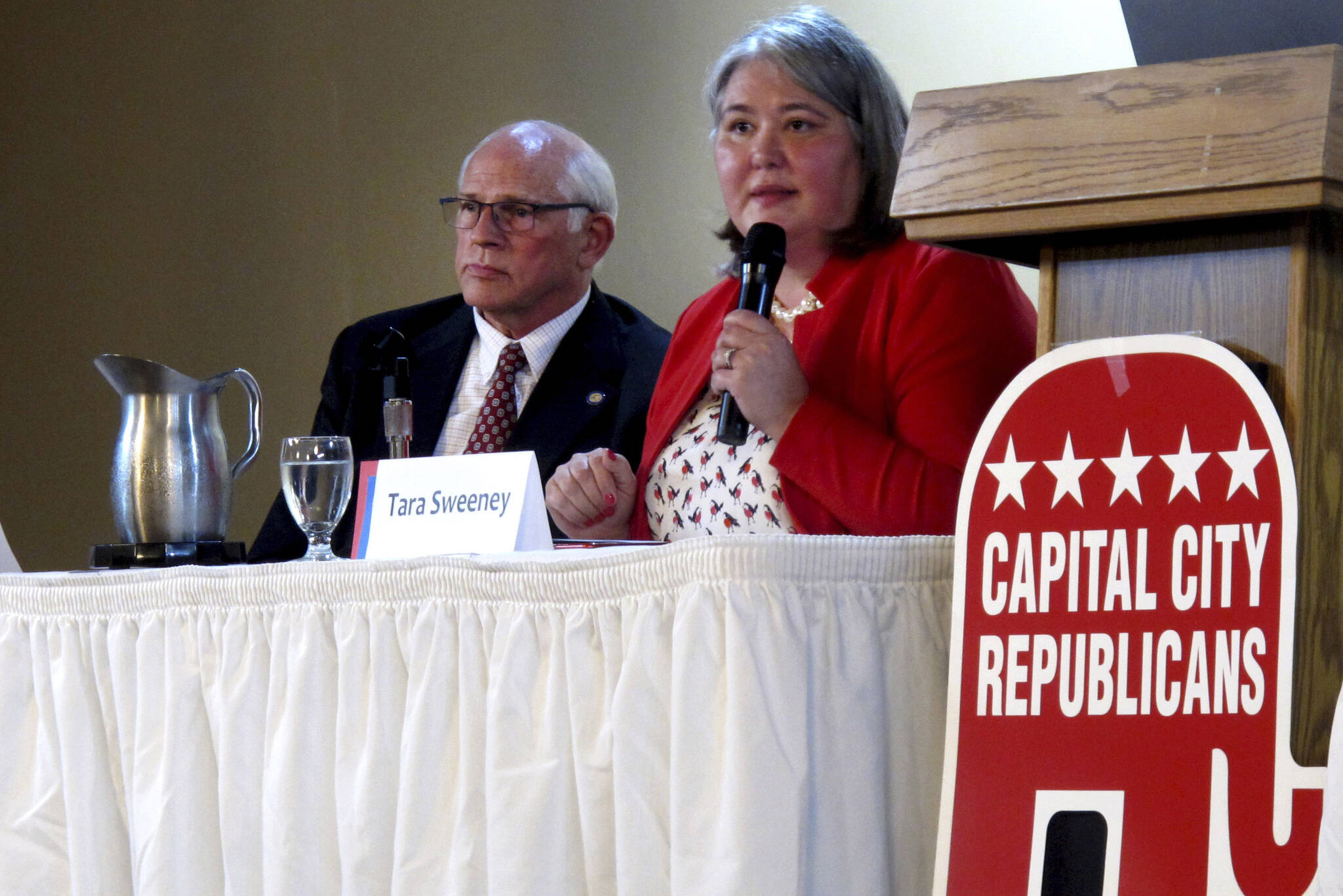 Republican Tara Sweeney, right, speaks Monday, May 16, 2022, at a forum in Juneau, Alaska, that was also attended by three other Republican candidates for Alaska’s U.S. House seat, including John Coghill, left. Sweeney and Coghill are among 48 candidates in a June 11 special primary for the House seat left vacant by the death earlier this year of Republican Rep. Don Young. (AP Photo/Becky Bohrer)