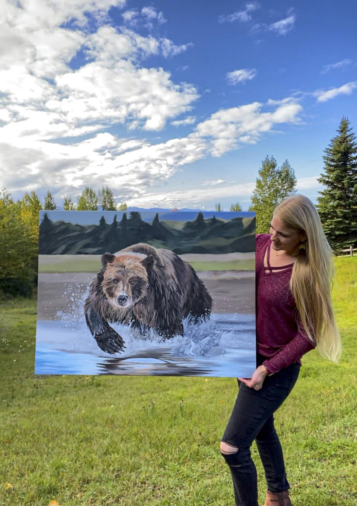 Photo provided 
Tarryn Zerbinos shows one of her paintings to be displayed in June at Grace Ridge Brewing.