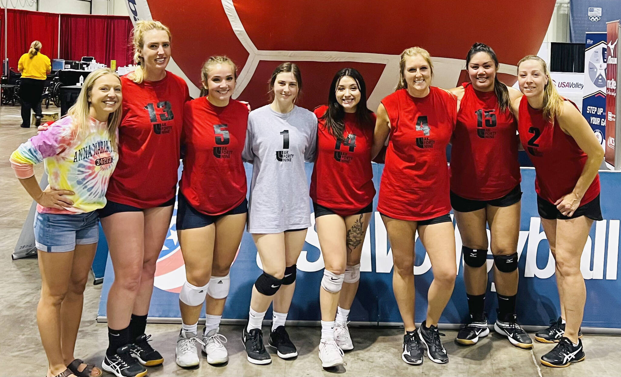 Members of the AK-49ers, Stacey Segura, Jordan Weber, Viannie Kazan, Kelsey Clark, Shaylynn Zener, Amanda McDowell, Maureen Sabado and Laura Roofe, pose at the 2022 USA Volleyball Open National Championship in Orlando, Florida. The event was held from May 27 to June 1. The AK-49ers placed 17th out of 35 teams in the Women's B Division and fifth in the bronze bracket. (Photo provided)