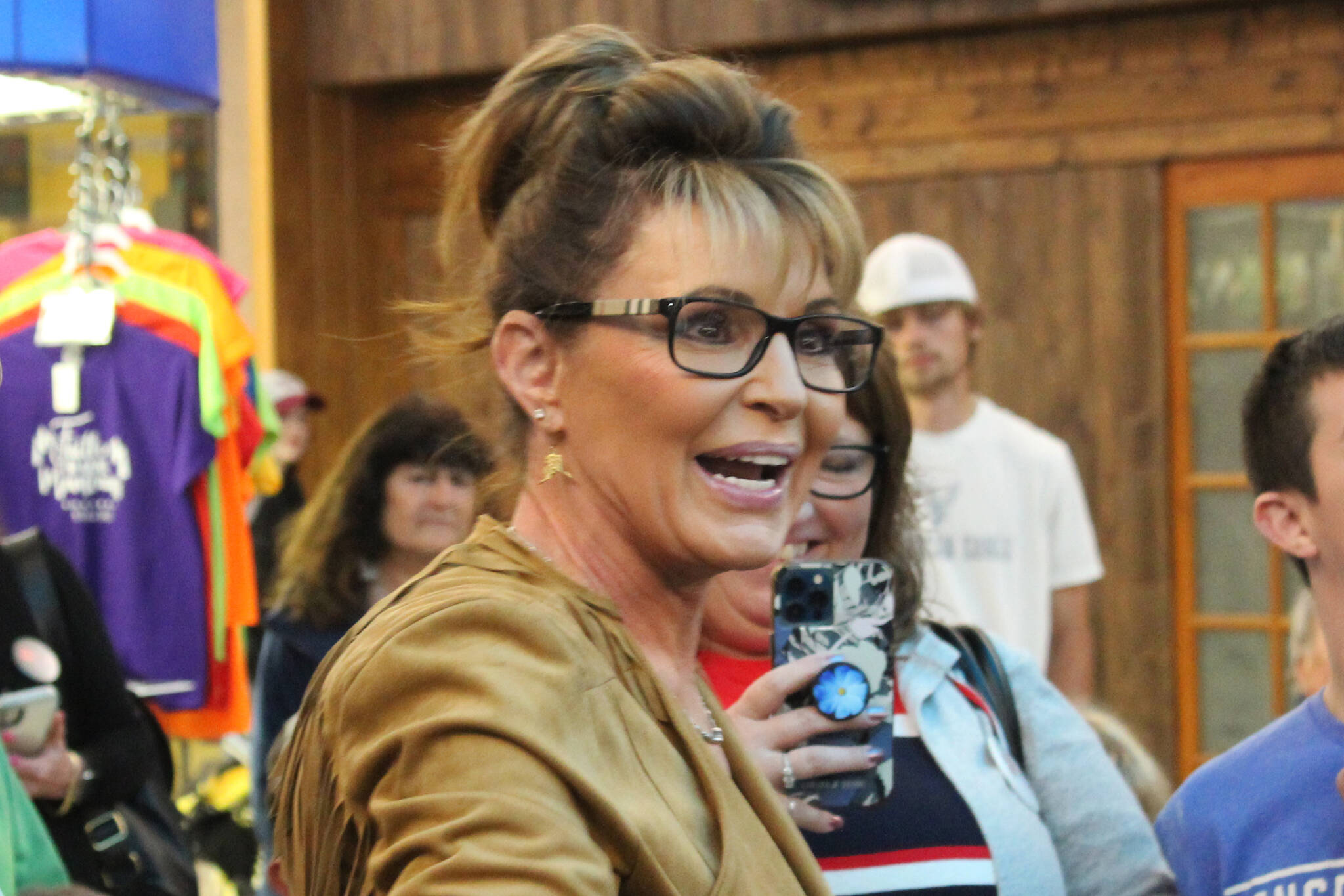 Former Alaska Gov. and current congressional hopeful Sarah Palin speaks with attendees at a meet and greet event outside of Ginger’s Restaurant on Saturday, May 14, 2022, in Soldotna, Alaska. (Ashlyn O’Hara/Peninsula Clarion)