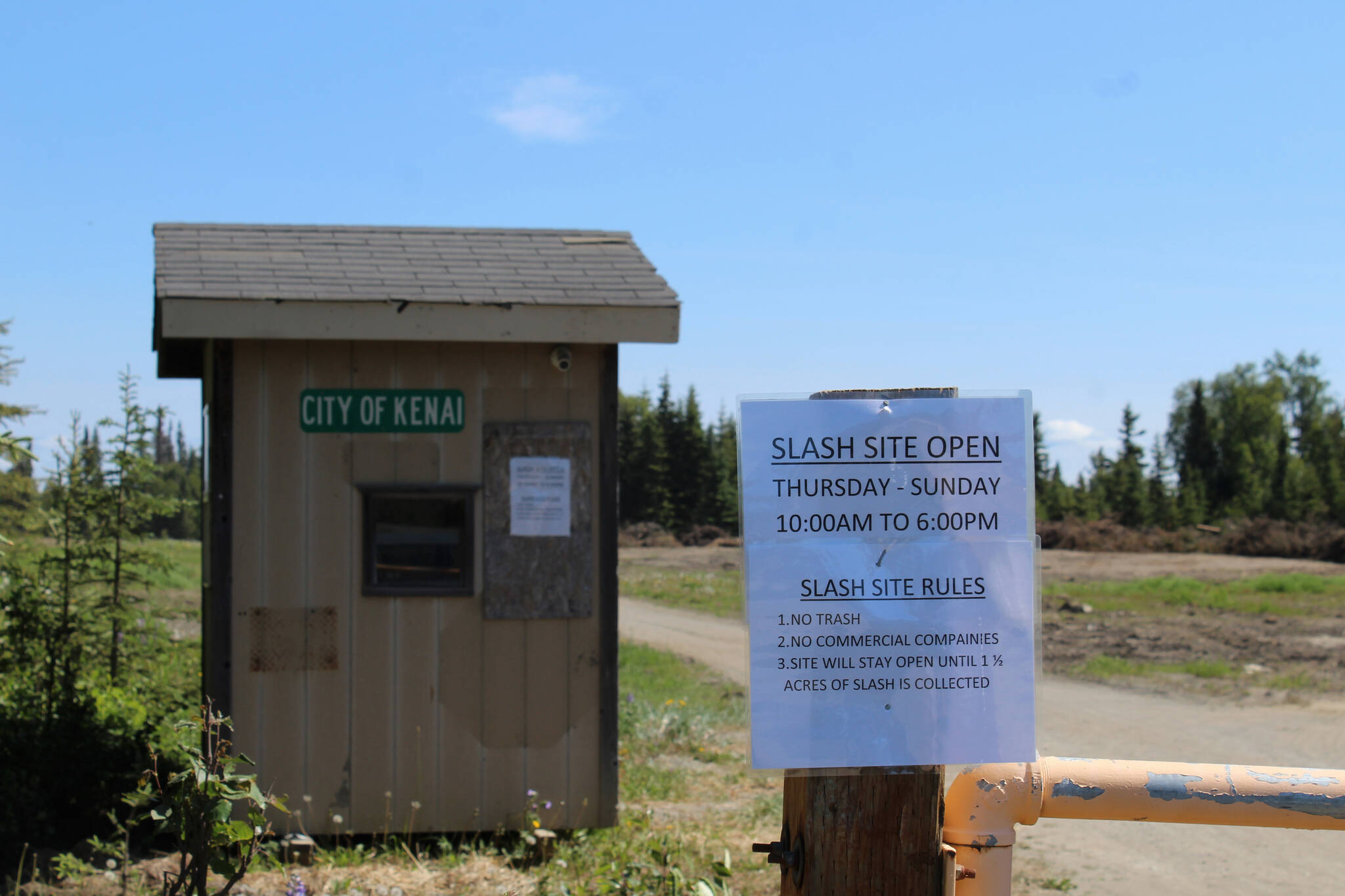 Signage marks the entrance of the City of Kenai’s slash disposal site on Wednesday, June 15, 2022, in Kenai, Alaska. (Ashlyn O’Hara/Peninsula Clarion)
