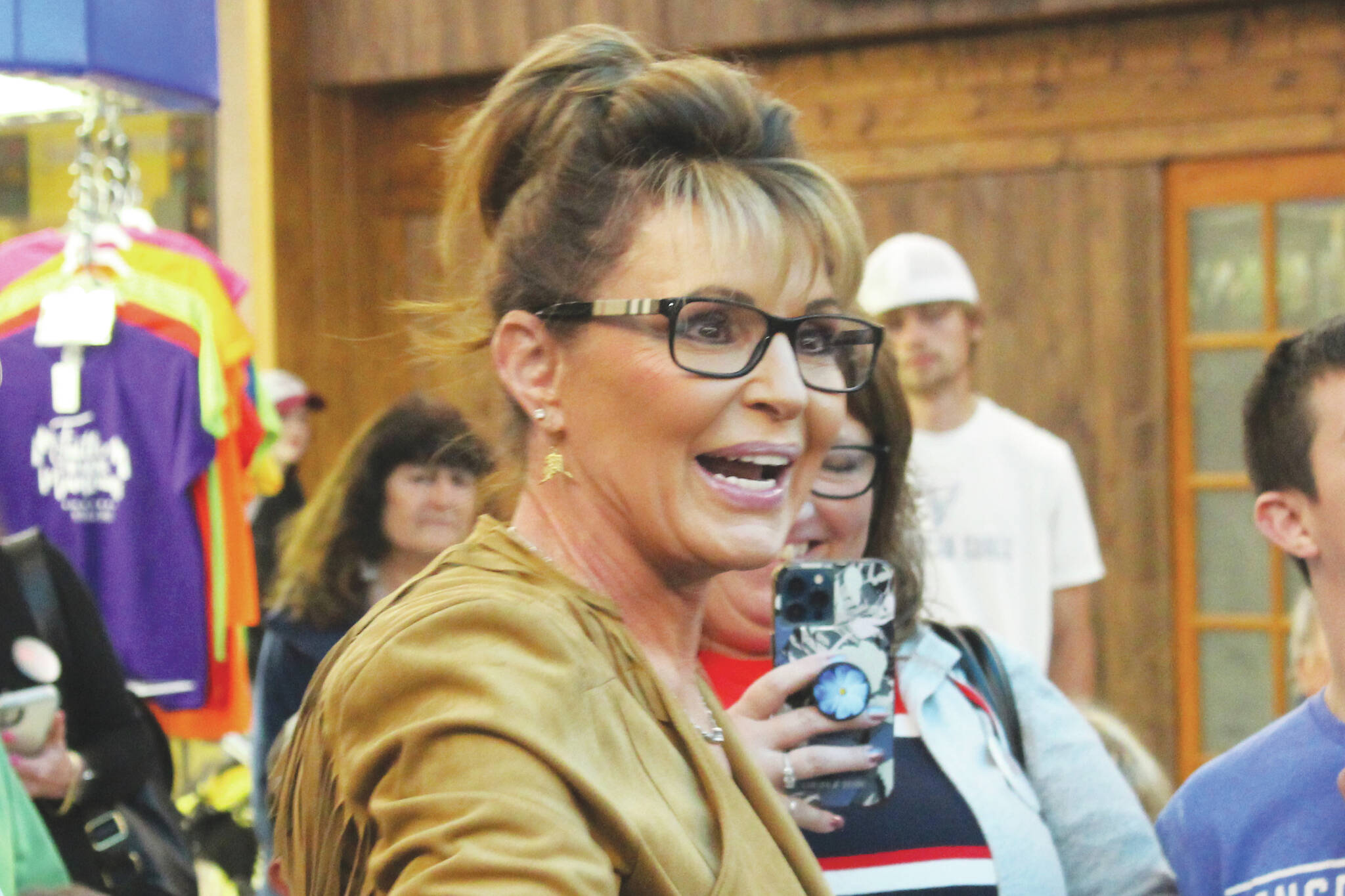Former Alaska Governor and current Congressional hopeful Sarah Palin speaks with attendees at a meet and greet event outside of Ginger’s Restaurant on Saturday, May 14, 2022 in Soldotna, Alaska. (Ashlyn O’Hara/Peninsula Clarion)