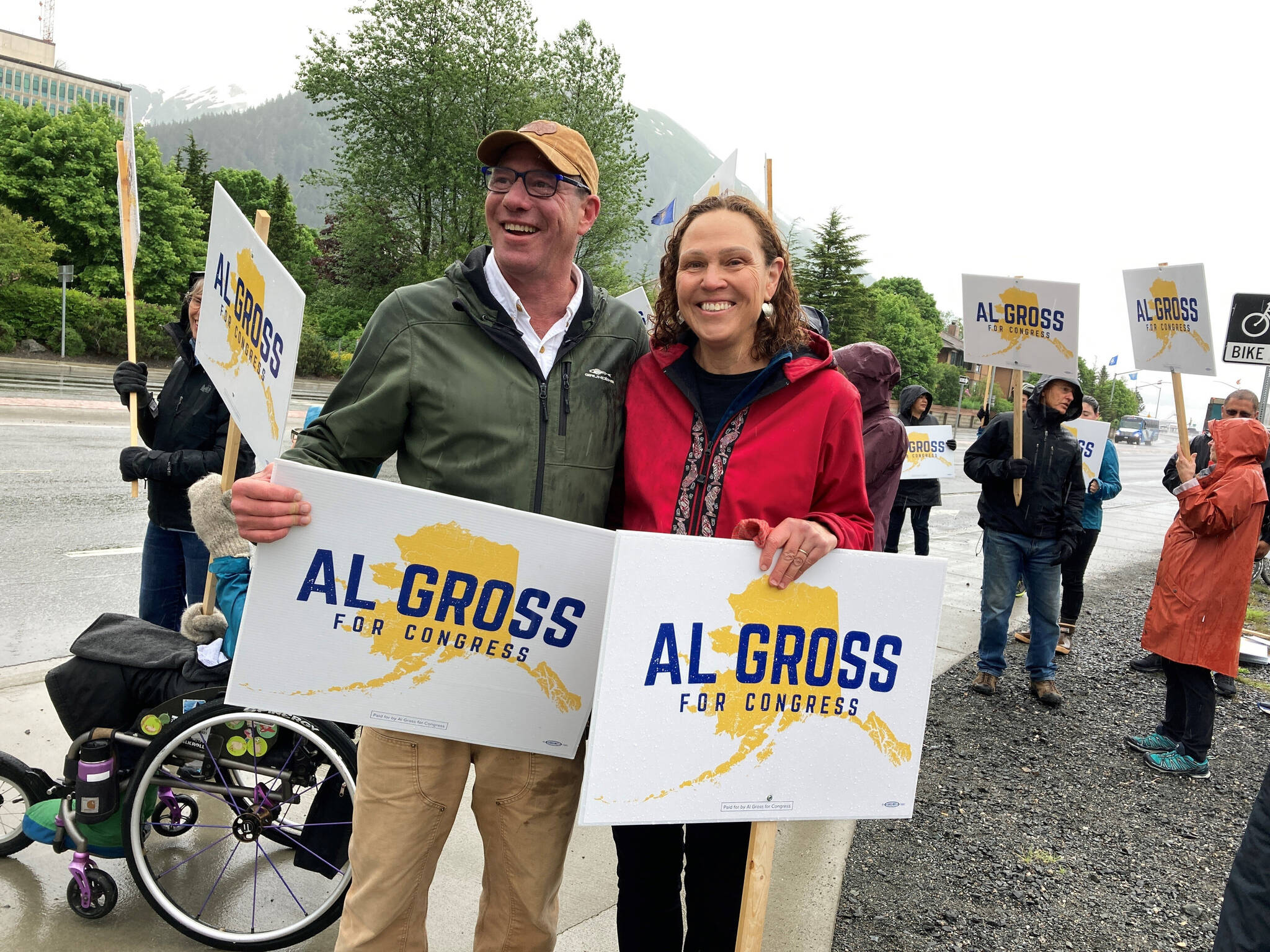 Al Gross, left, an independent running for Alaska’s U.S. House seat, poses beside his wife, Monica Gross, on Saturday, June 11, 2022, in Juneau, Alaska. Gross is one of 48 candidates in Saturday’s special primary for the House seat left vacant following the death in March of U.S. Rep. Don Young, who’d held the seat for 49 years. (AP Photo/Becky Bohrer)