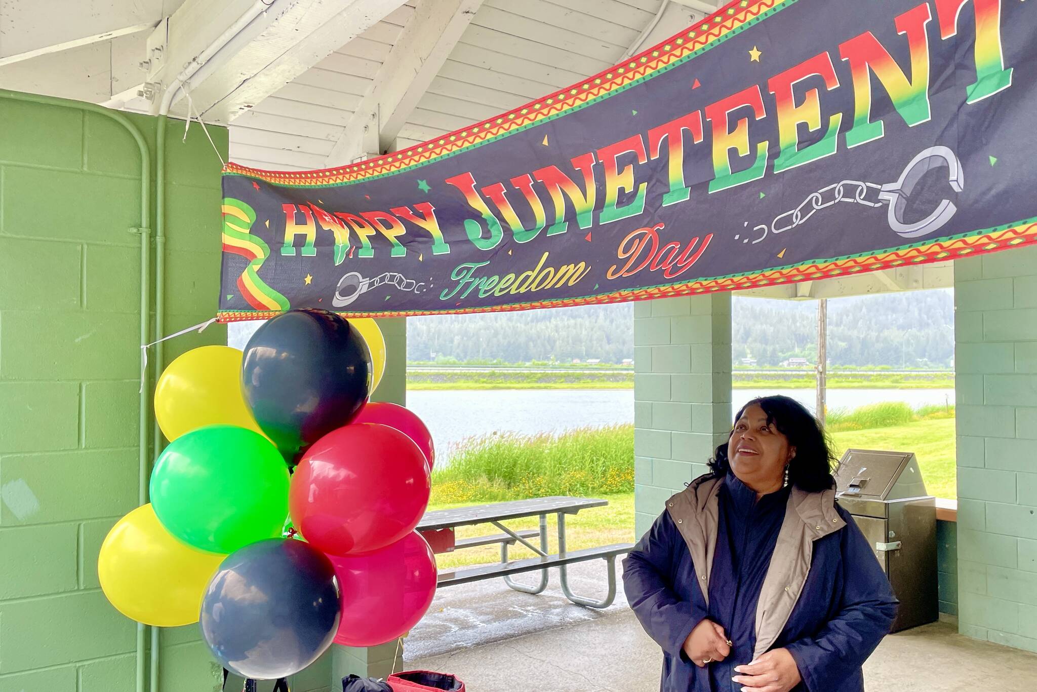 Sherry Patterson, president of the Black Awareness Association in Juneau, looks out as the group sells sweet potato pies as a fundraiser for a college scholarship fund during a Juneteenth celebration on June 19, 2022 in Juneau, Alaska. (Michael S. Lockett / Juneau Empire)