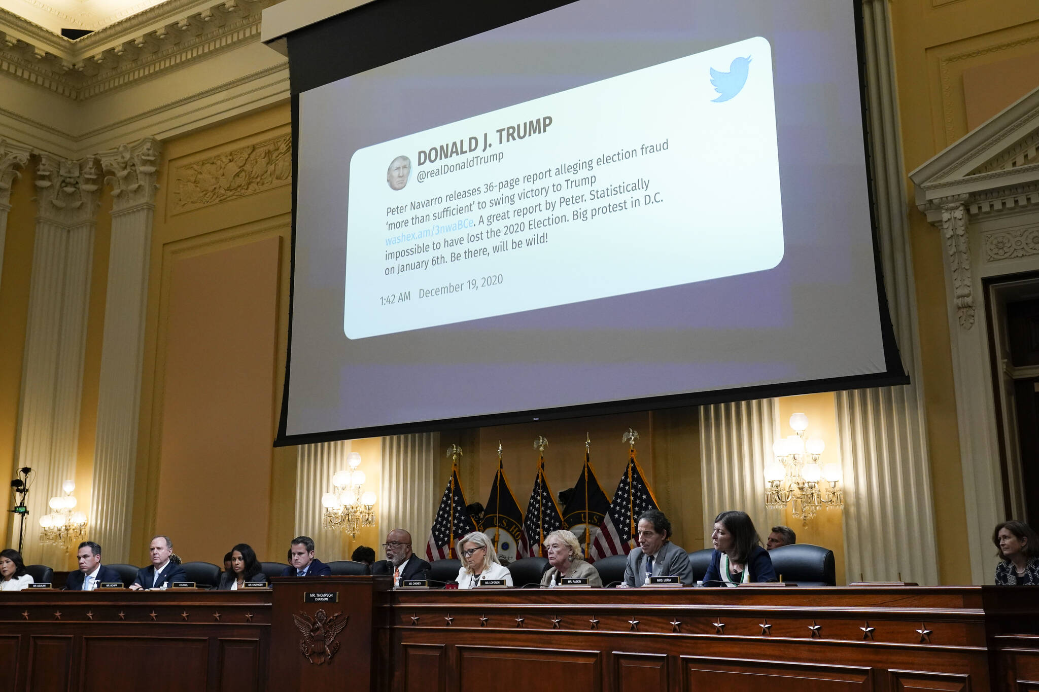 A tweet from former President Donald Trump is displayed as the House select committee investigating the Jan. 6 attack on the U.S. Capitol continues to reveal its findings of a year-long investigation, at the Capitol in Washington, Thursday, June 23, 2022. From left, Rep. Stephanie Murphy, D-Fla., Rep. Pete Aguilar, D-Calif., Rep. Adam Schiff, D-Calif., Soumya Dayananda, committee investigative staff counsel, Rep. Adam Kinzinger, R-Ill., Chairman Bennie Thompson, D-Miss., Vice Chair Liz Cheney, R-Wyo., Rep. Zoe Lofgren, D-Calif., Rep. Jamie Raskin, D-Md., and Rep. Elaine Luria, D-Va. (AP Photo/J. Scott Applewhite)
