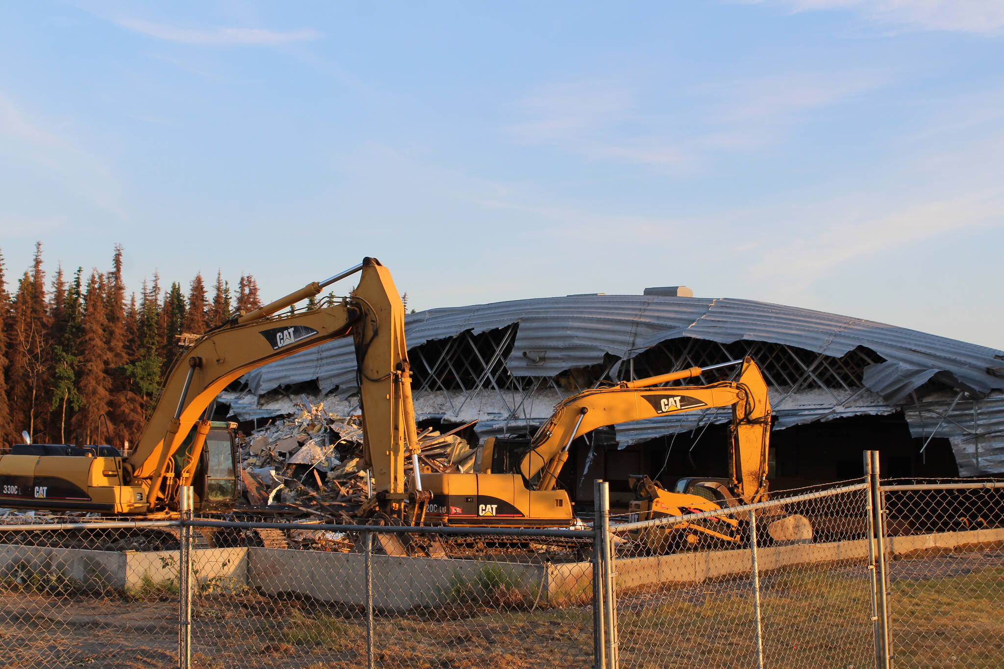 Buldozers sit outside of the former Kenai Bowling Alley on Thursday, June 23, 2022, in Kenai, Alaska. (Ashlyn O’Hara/Peninsula Clarion)