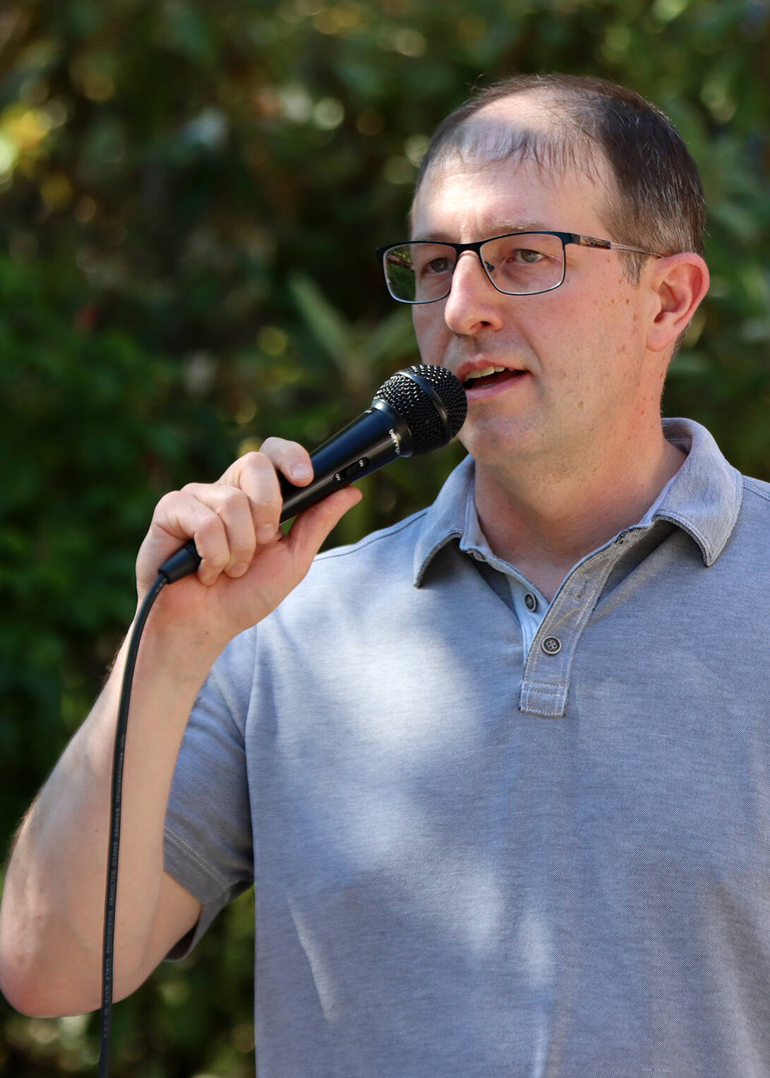 State Sen. Jesse Kiehl, D-Juneau, gives a fiery speech Saturday at a rally protesting the U.S. Supreme Court’s decision to overturn Roe v. Wade. Kiehl called the decision “crap” based on middle school-level reasoning. He also decried the decision’s implications for other landmark privacy cases. (Ben Hohenstatt / Juneau Empire)