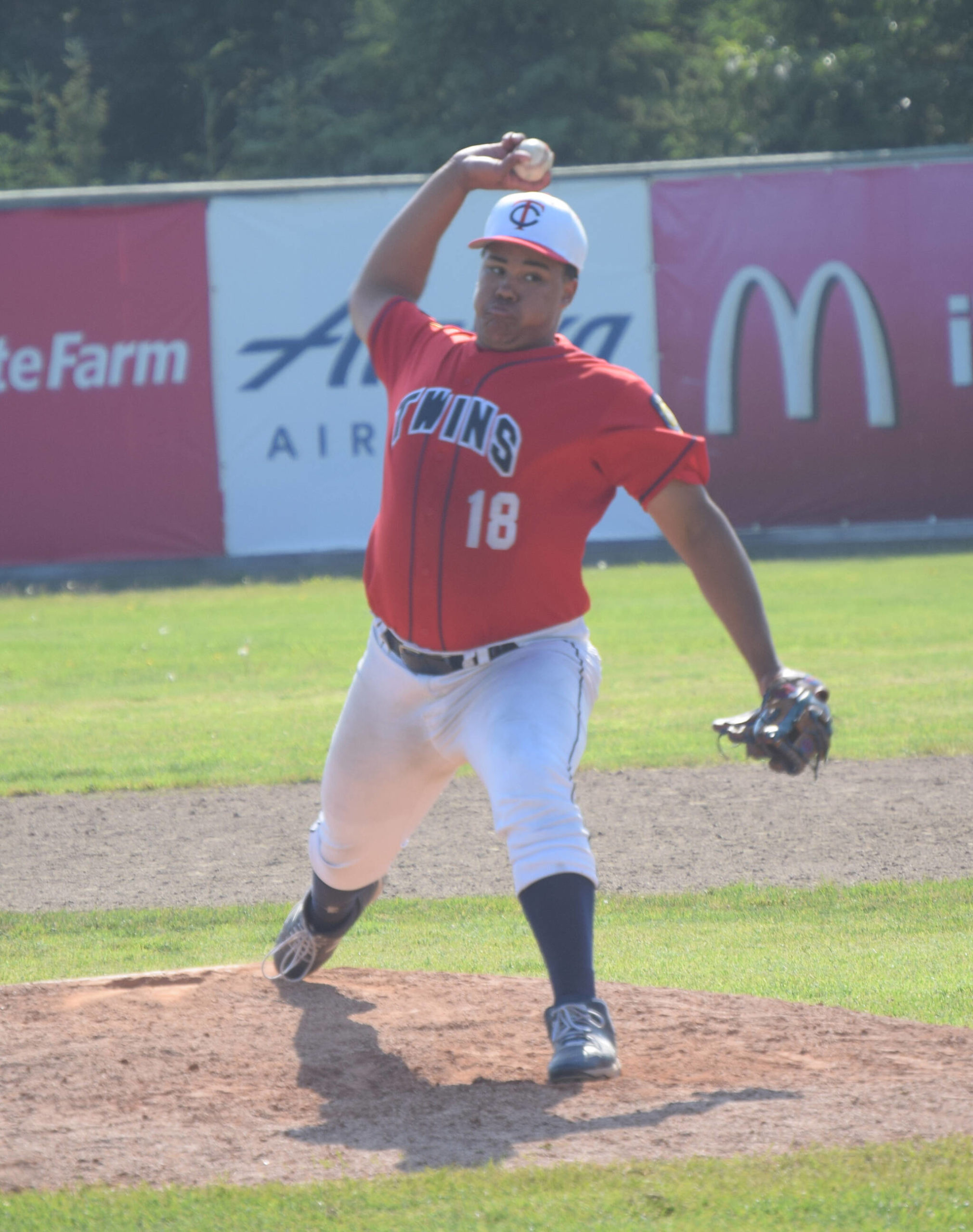 Post 20 Twins relief pitcher Atticus Gibson delivers to the Buffalo (Minnesota) Post 270 Cobras on Tuesday, June 28, 2022, during the Bill Miller/Lance Coz Wood Bat Invitational at Coral Seymour Memorial Park in Kenai, Alaska. (Photo by Jeff Helminiak/Peninsula Clarion)