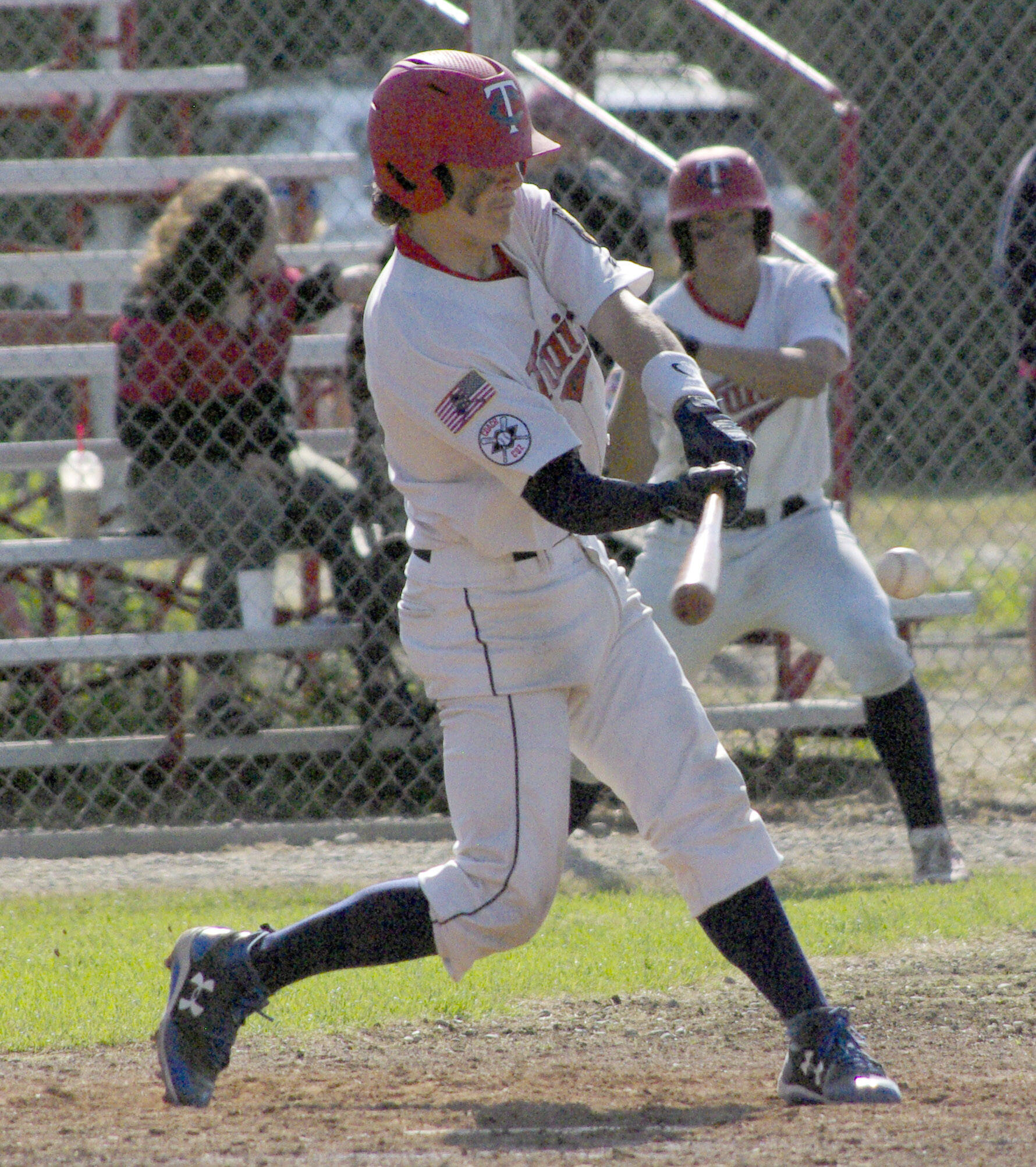 Post 20 Twins catcher Jacob Belger flies out against the Napoleon (Ohio) Post 300 River Bandits at the Bill Miller/Lance Coz Wood Bat Tournament on Thursday, June 30, 2022, at Coral Seymour Memorial Park in Kenai, Alaska. (Photo by Jeff Helminiak/Peninsula Clarion)