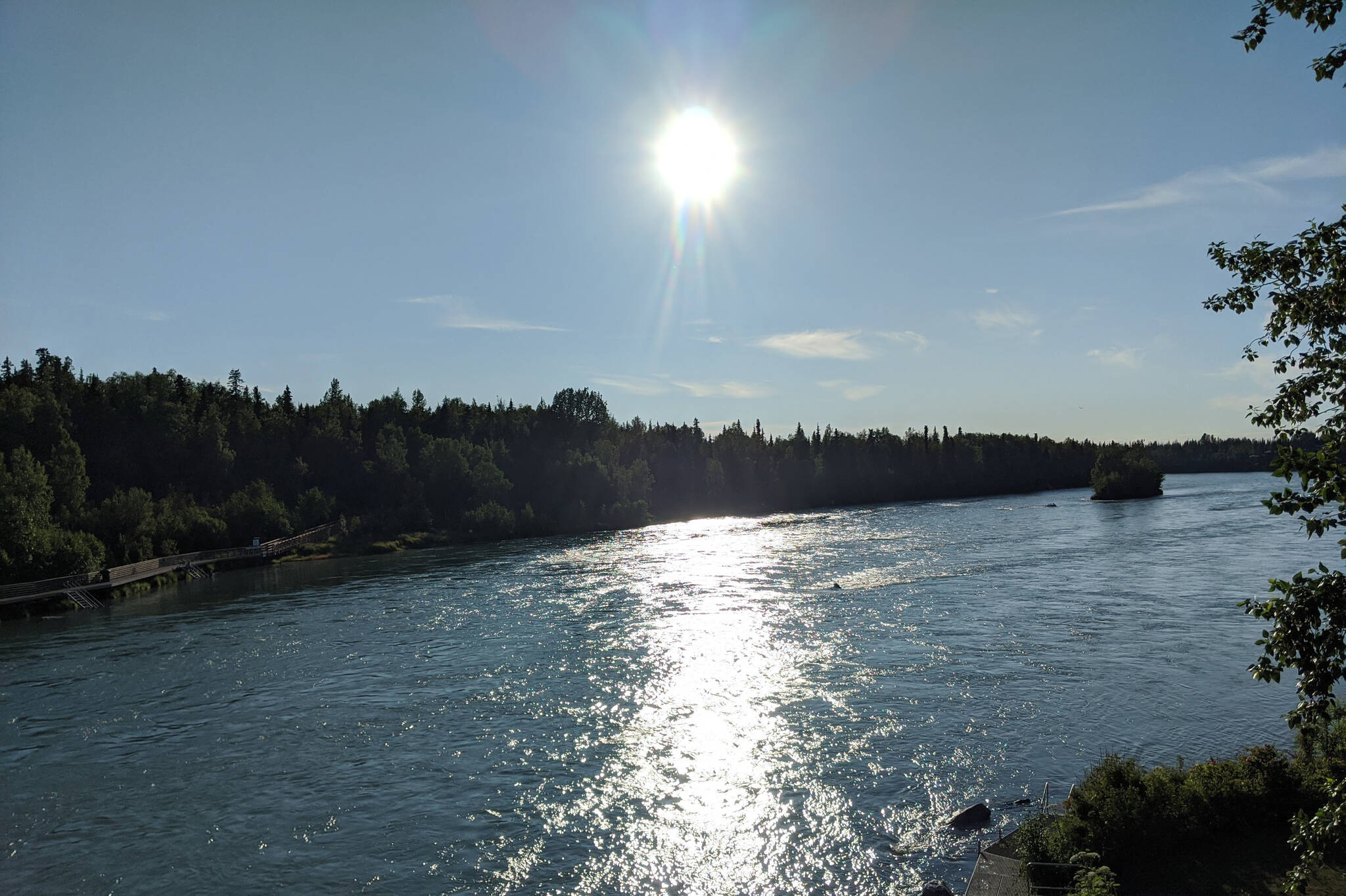The sun is seen shining above the Kenai River in Soldotna, Alaska, on July 14, 2020. (Photo by Erin Thompson/Peninsula Clario file)