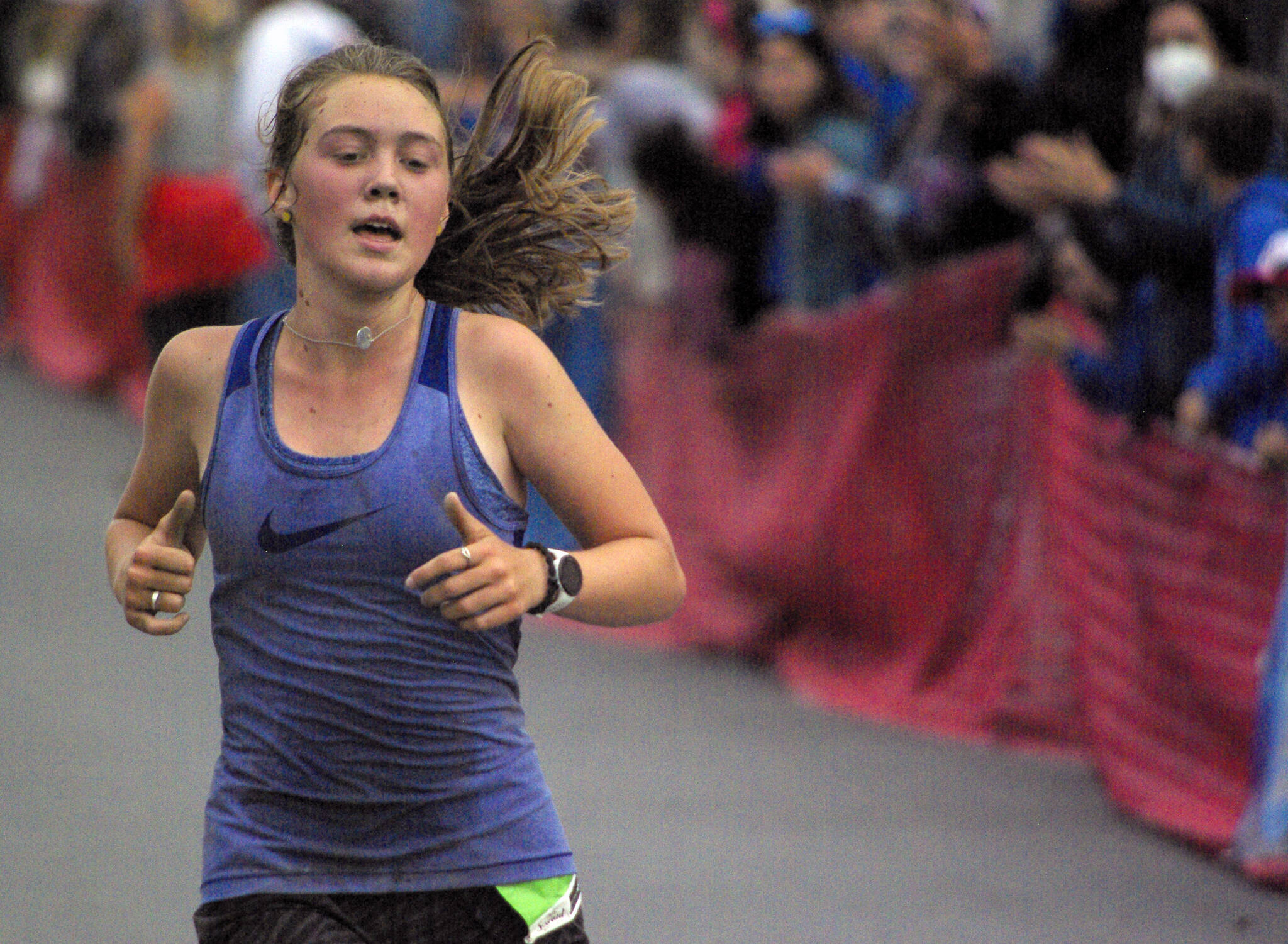 Rosie Conway of Anchorage wins the girls junior Mount Marathon Race on Monday, July 4, 2022, in Seward, Alaska. (Photo by Jeff Helminiak/Peninsula Clarion)