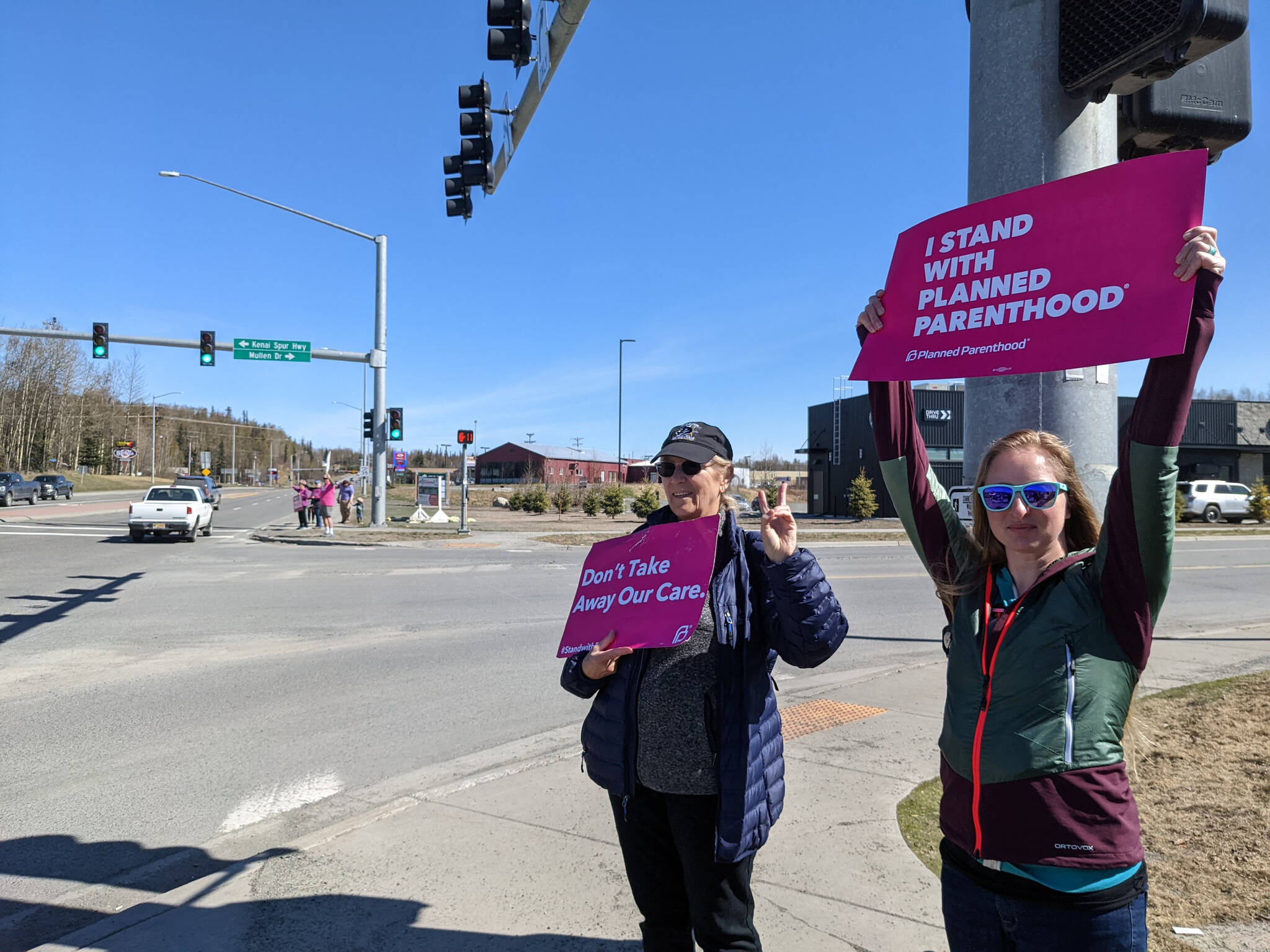 Demonstrators in support of abortion rights stand at the intersection of the Kenai and Sterling highways on Saturday, May 7, 2022, in Soldotna, Alaska. (Photo by Erin Thompson/Peninsula Clarion)