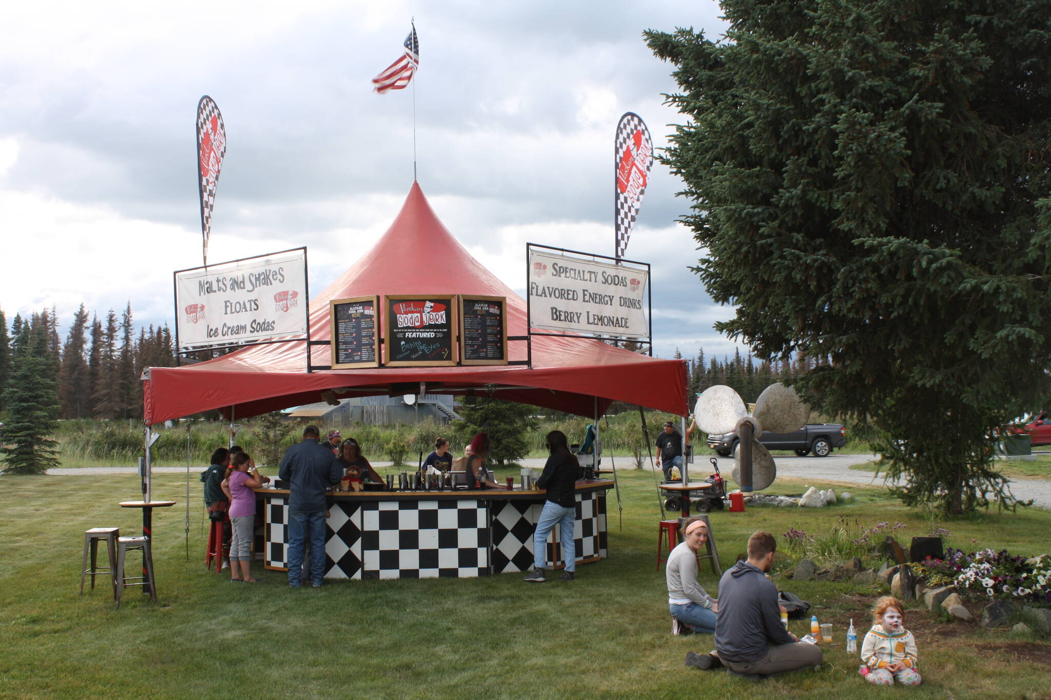 Community members attend the Rock’N the Ranch at the RustyRavin Music Festival in Kenai, Alaska, on Friday, July 8, 2022. (Camille Botello/Peninsula Clarion)