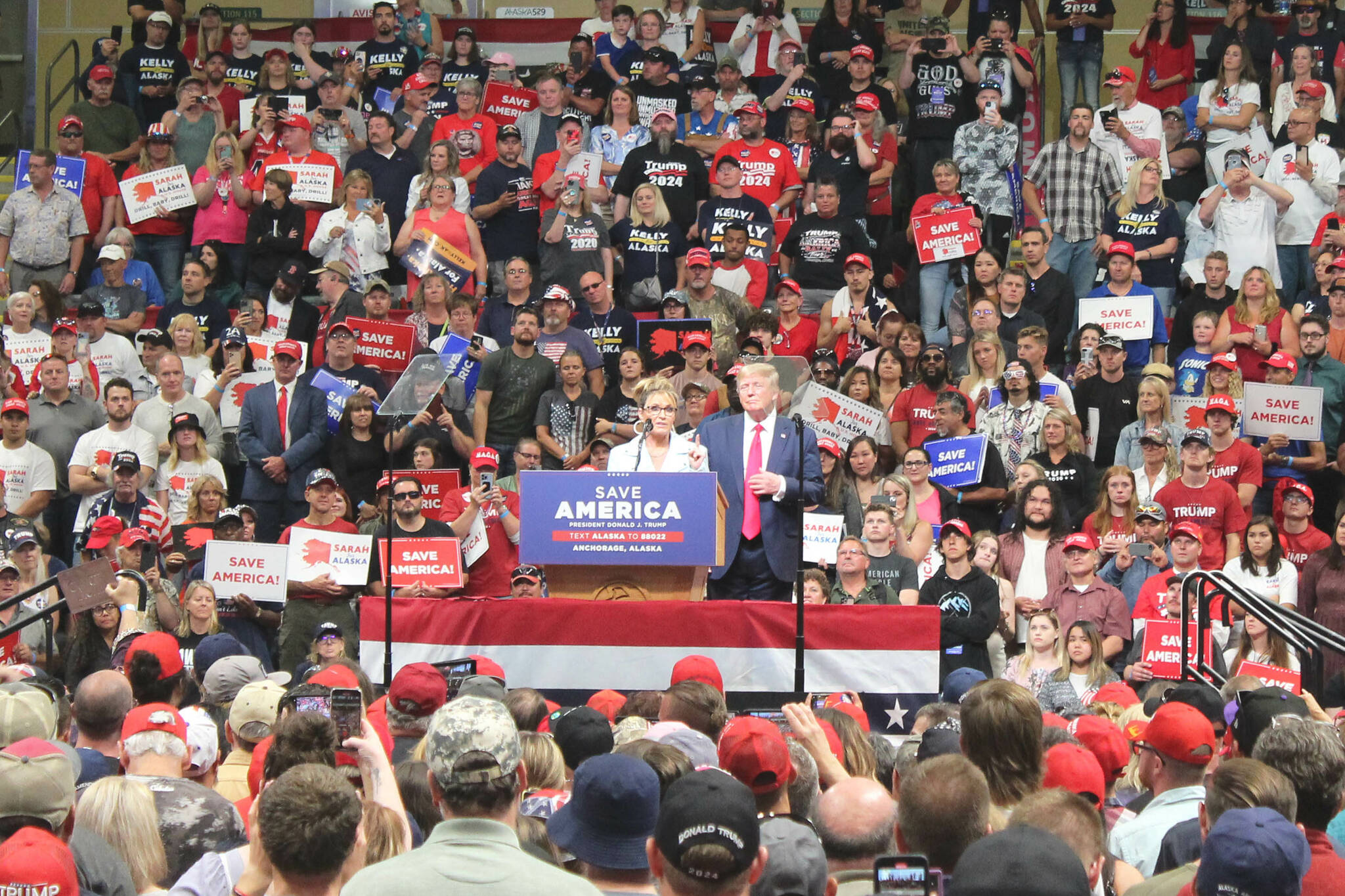 Sarah Palin (left) and Donald Trump (right) speak during a Save America rally at the Alaska Airlines Center on Saturday, July 9, 2022, in Anchorage, Alaska. (Ashlyn O’Hara/Peninsula Clarion)