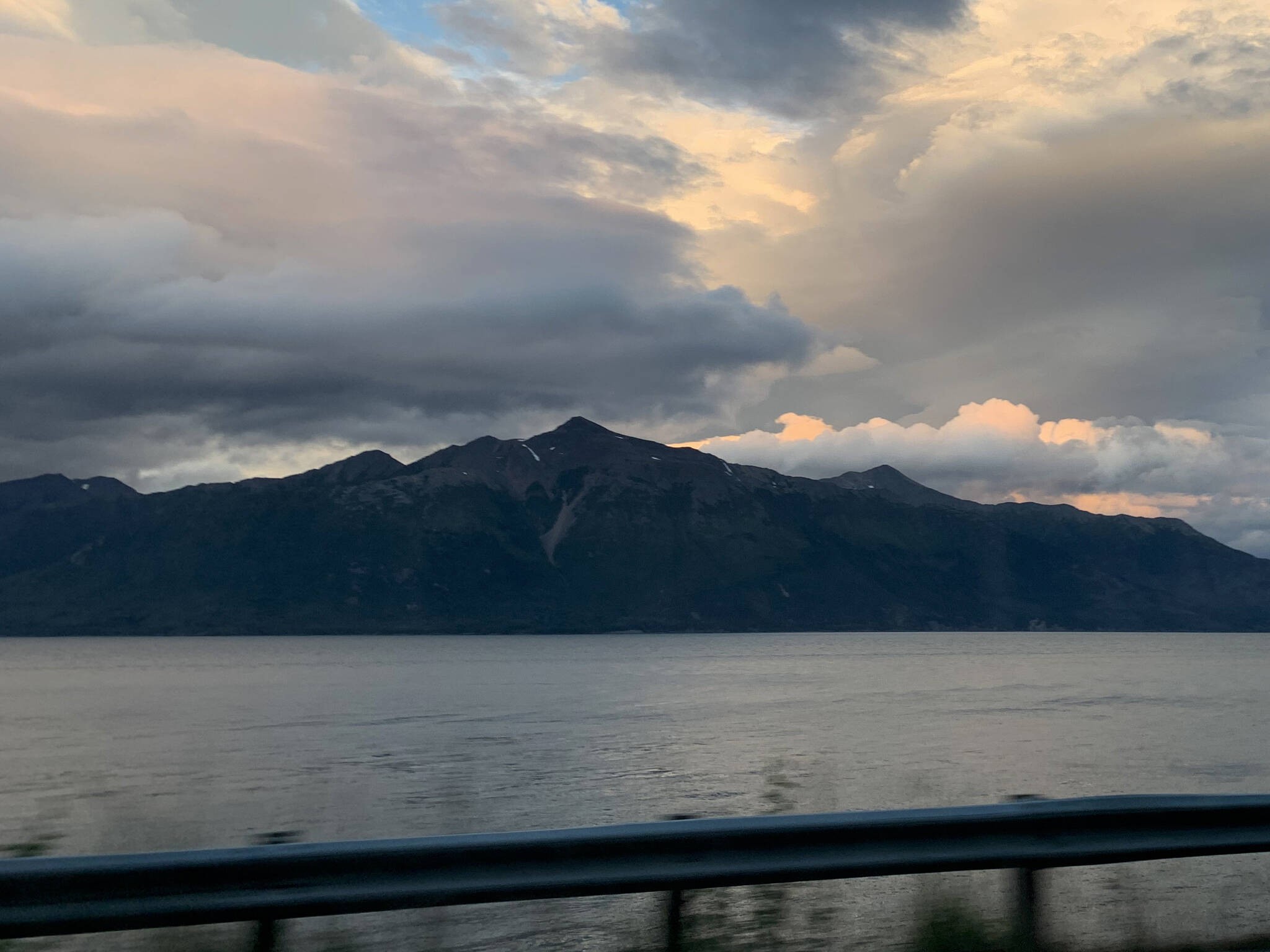 The sun shines on the Kenai Mountains in Turnagain Arm on Saturday, July 9, 2022 near Anchorage, Alaska. (Ashlyn O'Hara/Peninsula Clarion)