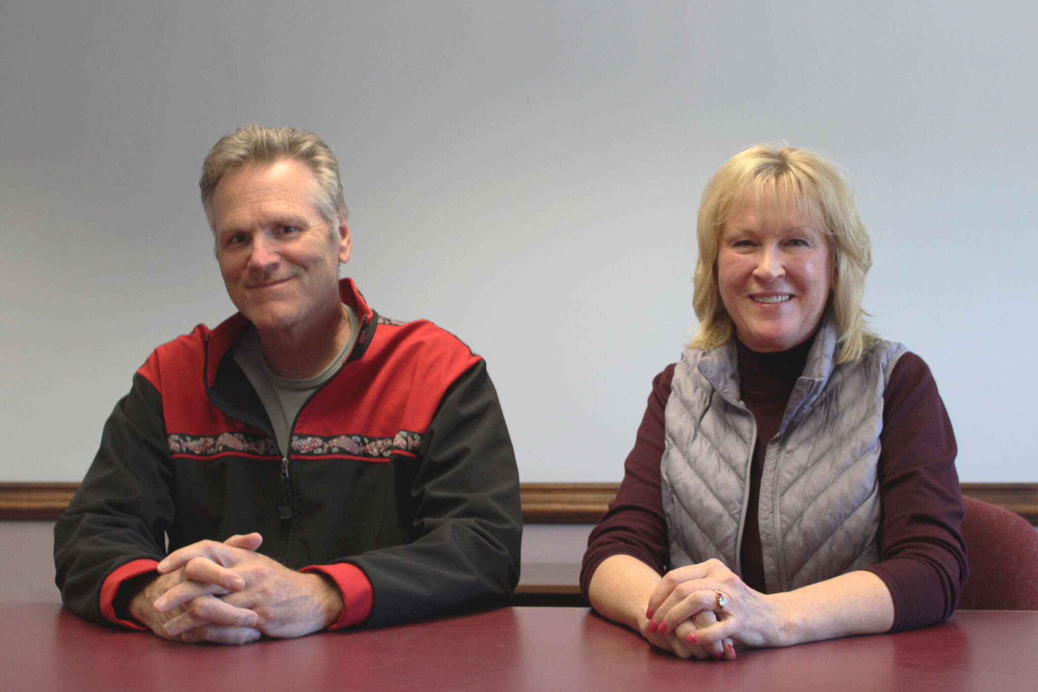 Gov. Mike Dunleavy, left, and Nancy Dahlstrom sit in the Peninsula Clarion offices on Friday, July 22, 2022 in Kenai, Alaska. (Ashlyn O’Hara/Peninsula Clarion)