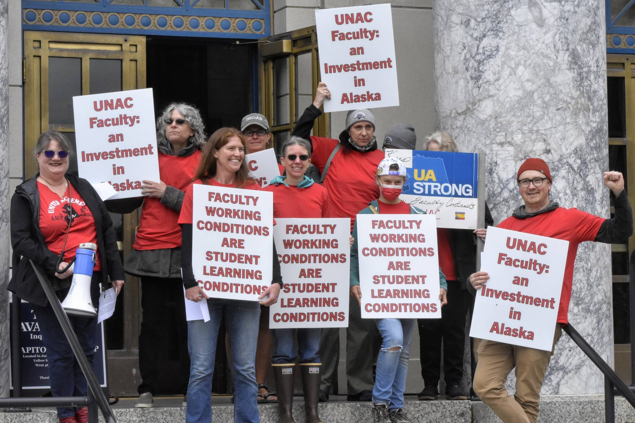 Members of United Academics - American Association of University Professors/American Federation of Teachers Local 4996 gathered on the steps of the Alaska State Capitol on Wednesday, June 22, 2022, to call on University of Alaska officials to agree to a negotiated contract. (Peter Segall / Juneau Empire)